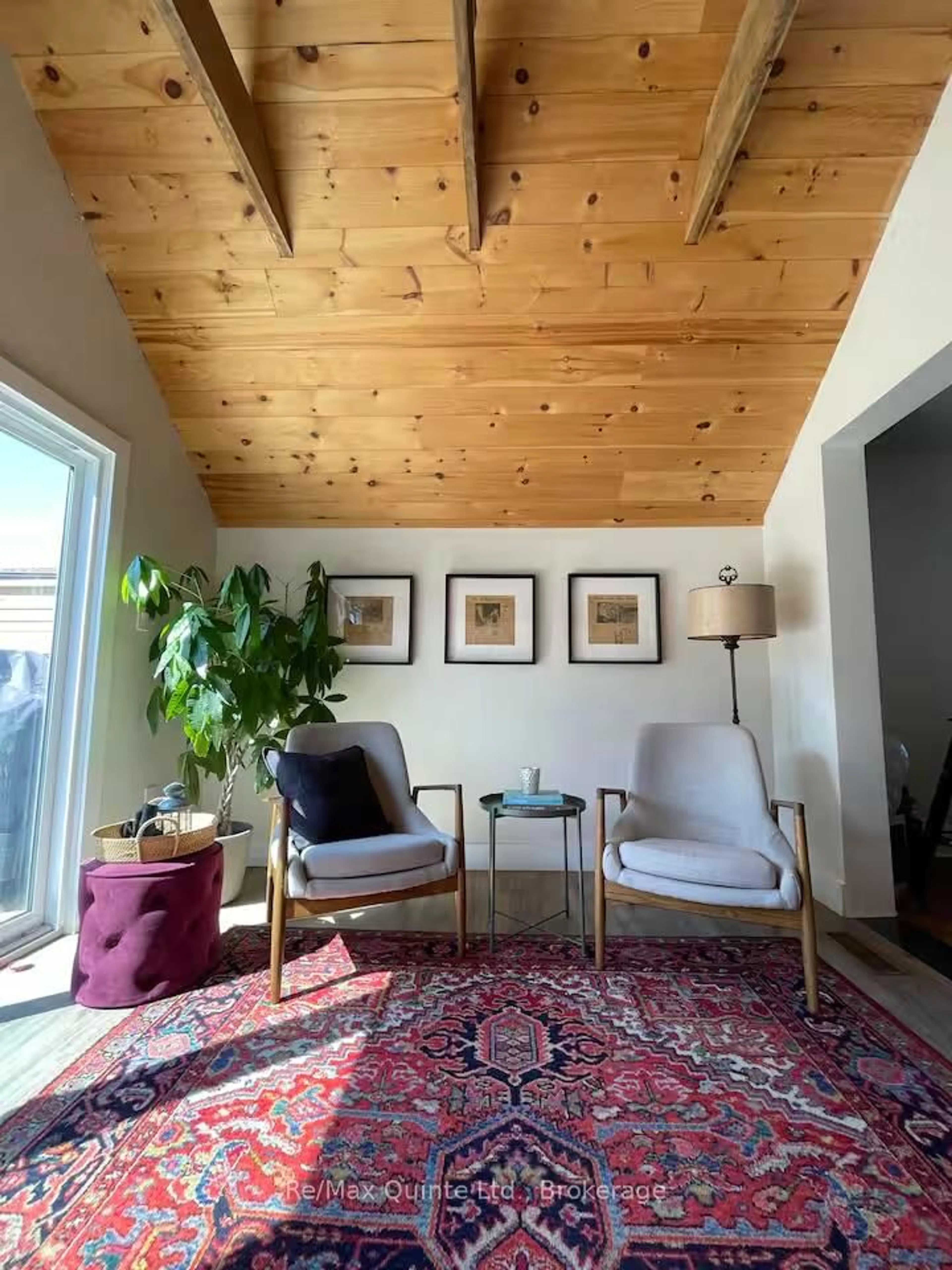 Living room with furniture, wood/laminate floor for 41 Hill St, Prince Edward County Ontario K0K 2T0