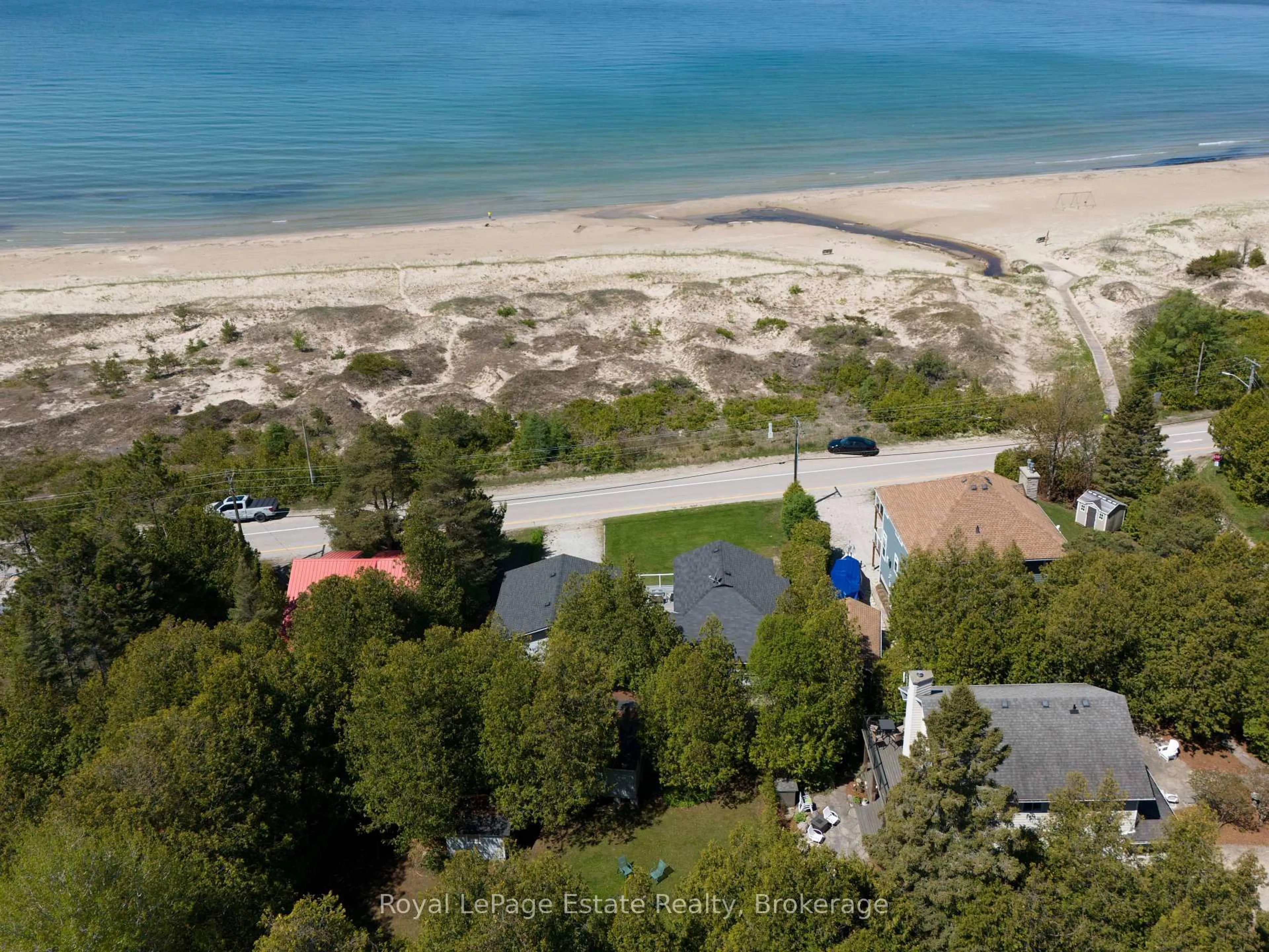 A pic from outside/outdoor area/front of a property/back of a property/a pic from drone, water/lake/river/ocean view for 1021 Lakeshore Blvd, South Bruce Peninsula Ontario N0H 2G0