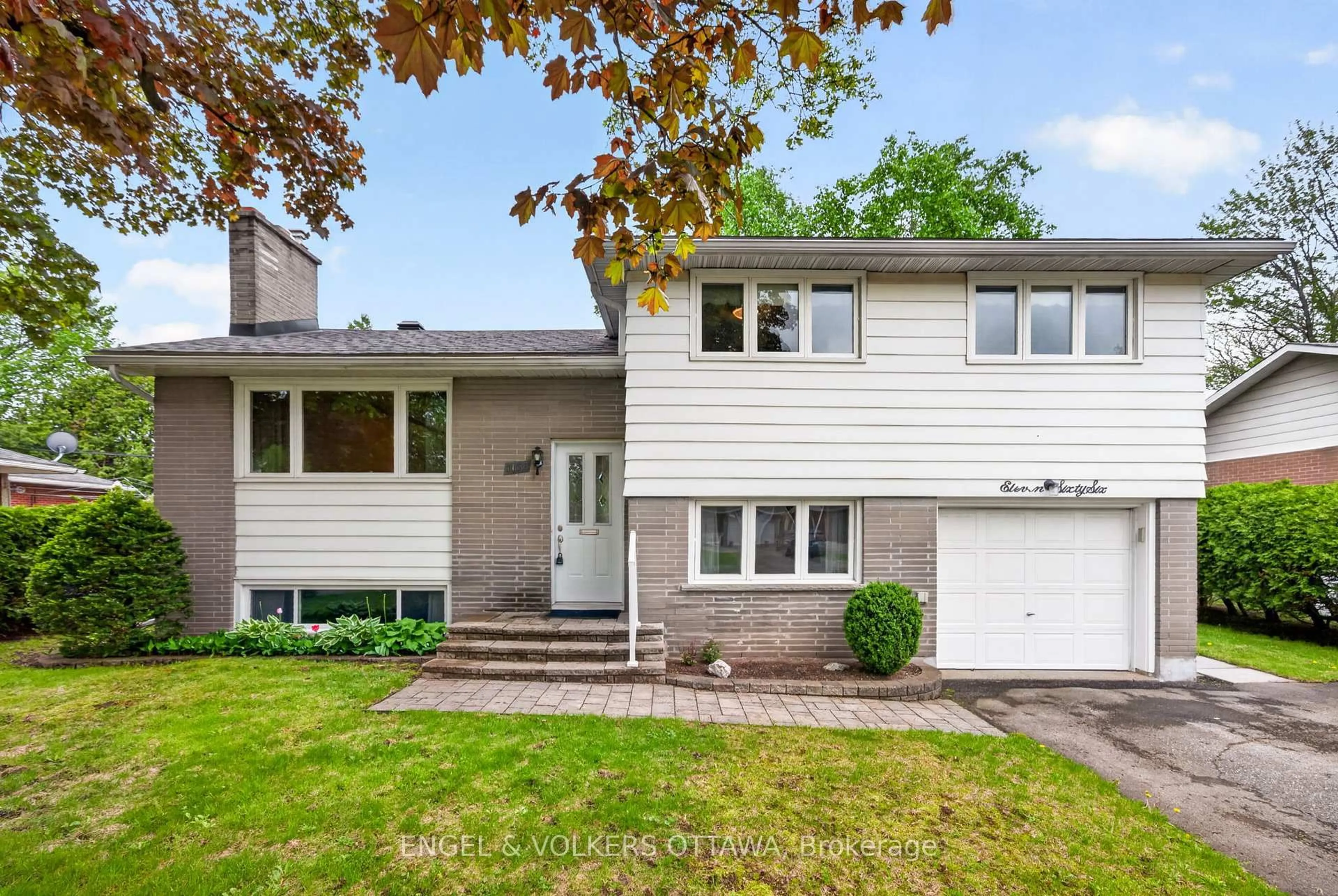 Home with vinyl exterior material, street for 1166 Castle Hill Cres, Ottawa Ontario K2C 2A8