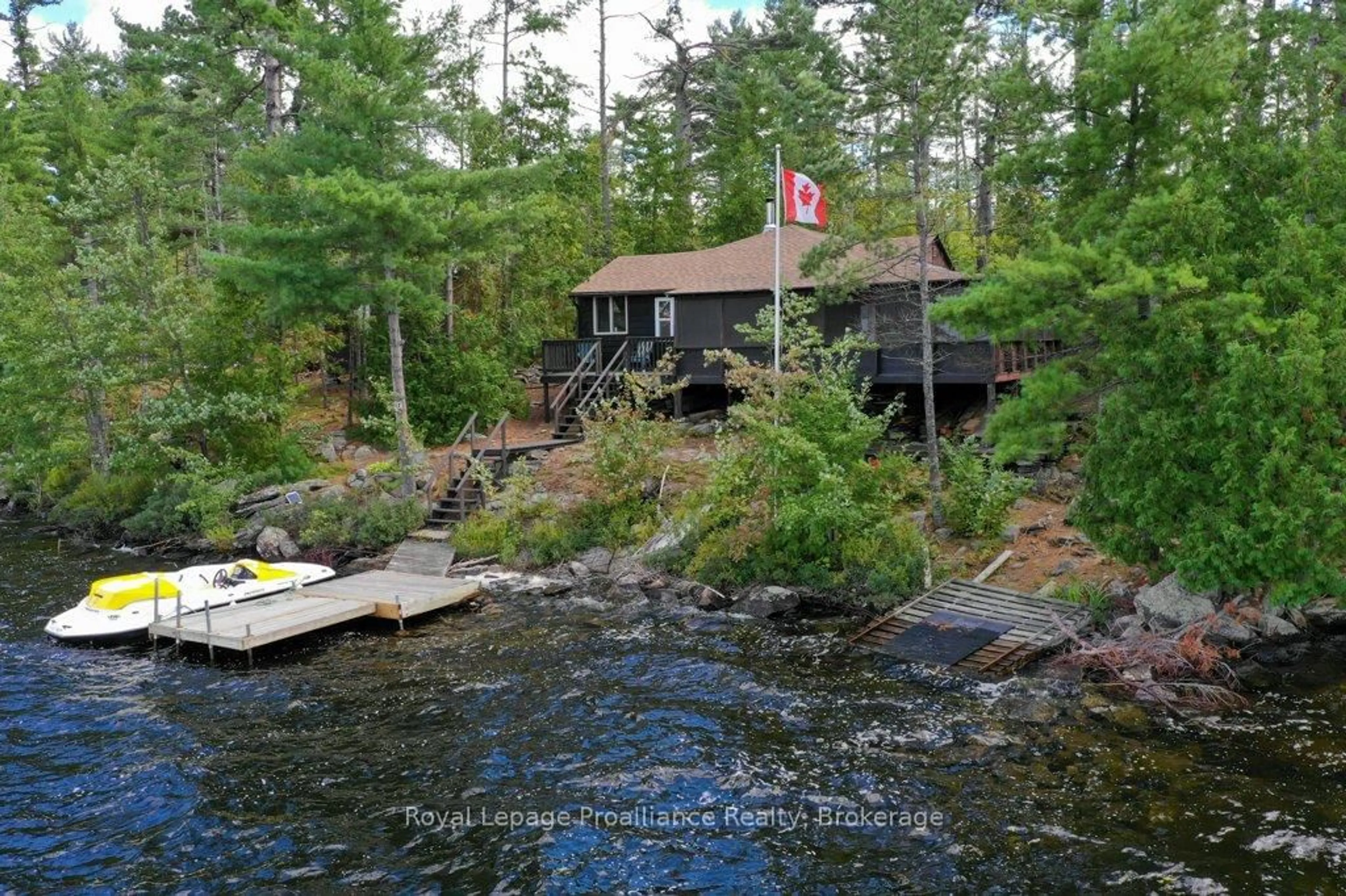 A pic from outside/outdoor area/front of a property/back of a property/a pic from drone, water/lake/river/ocean view for 258 Skootamatta Lake, Cloyne Ontario K0H 1K0