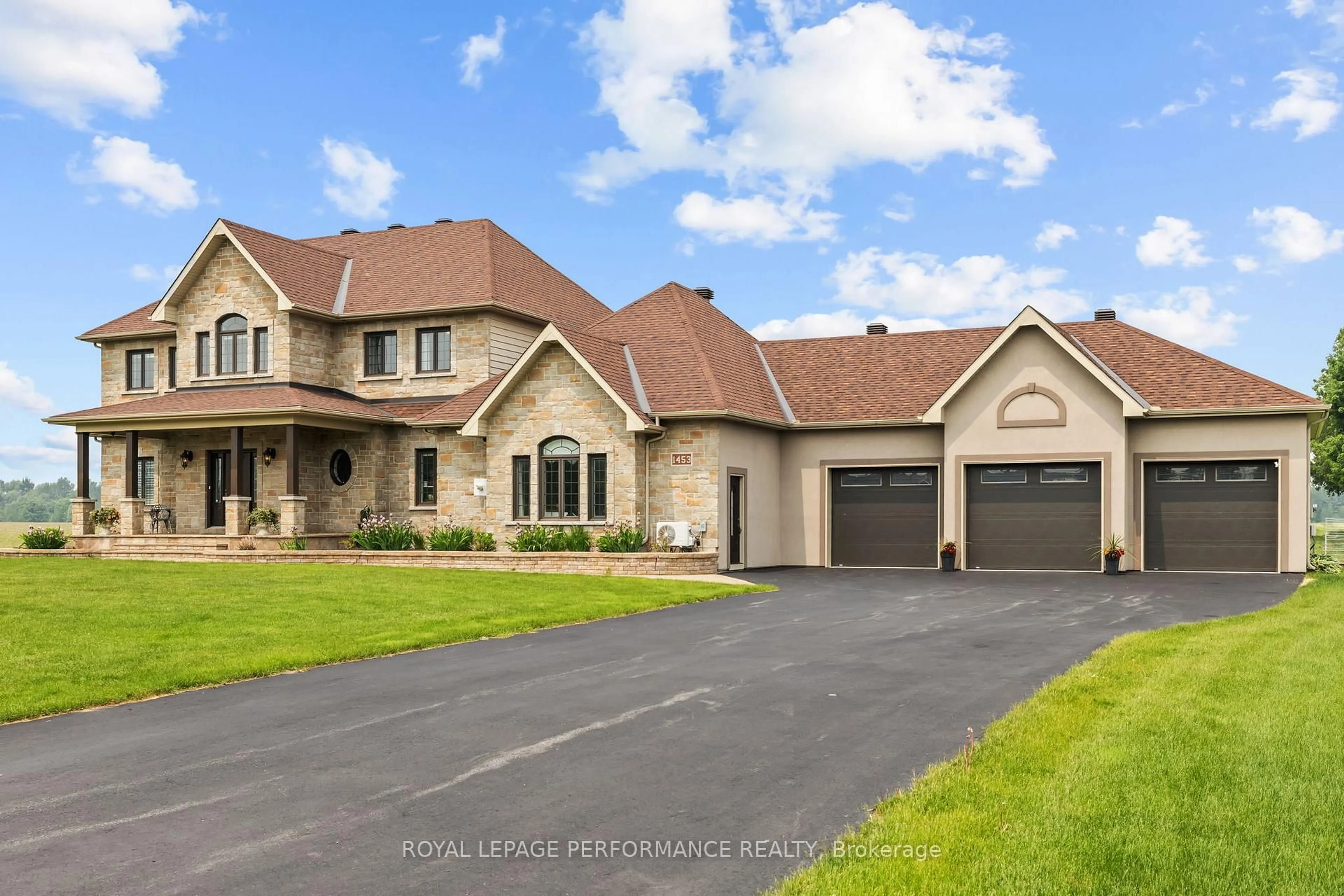Home with brick exterior material, street for 1453 Notre Dame St, Russell Ontario K0A 1W0