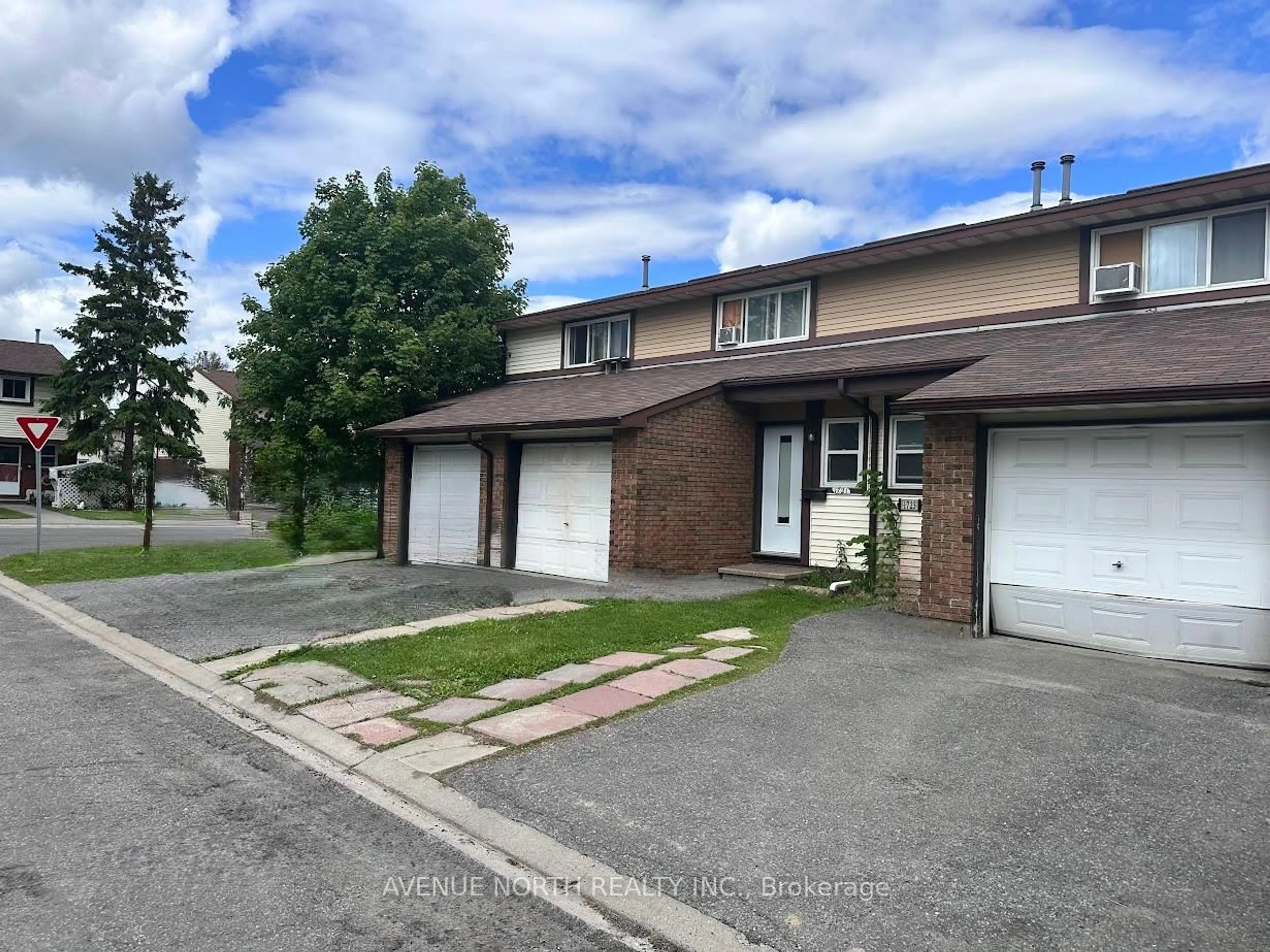 A pic from outside/outdoor area/front of a property/back of a property/a pic from drone, street for 1721 Ambrose Dr, Ottawa Ontario K1B 5J5