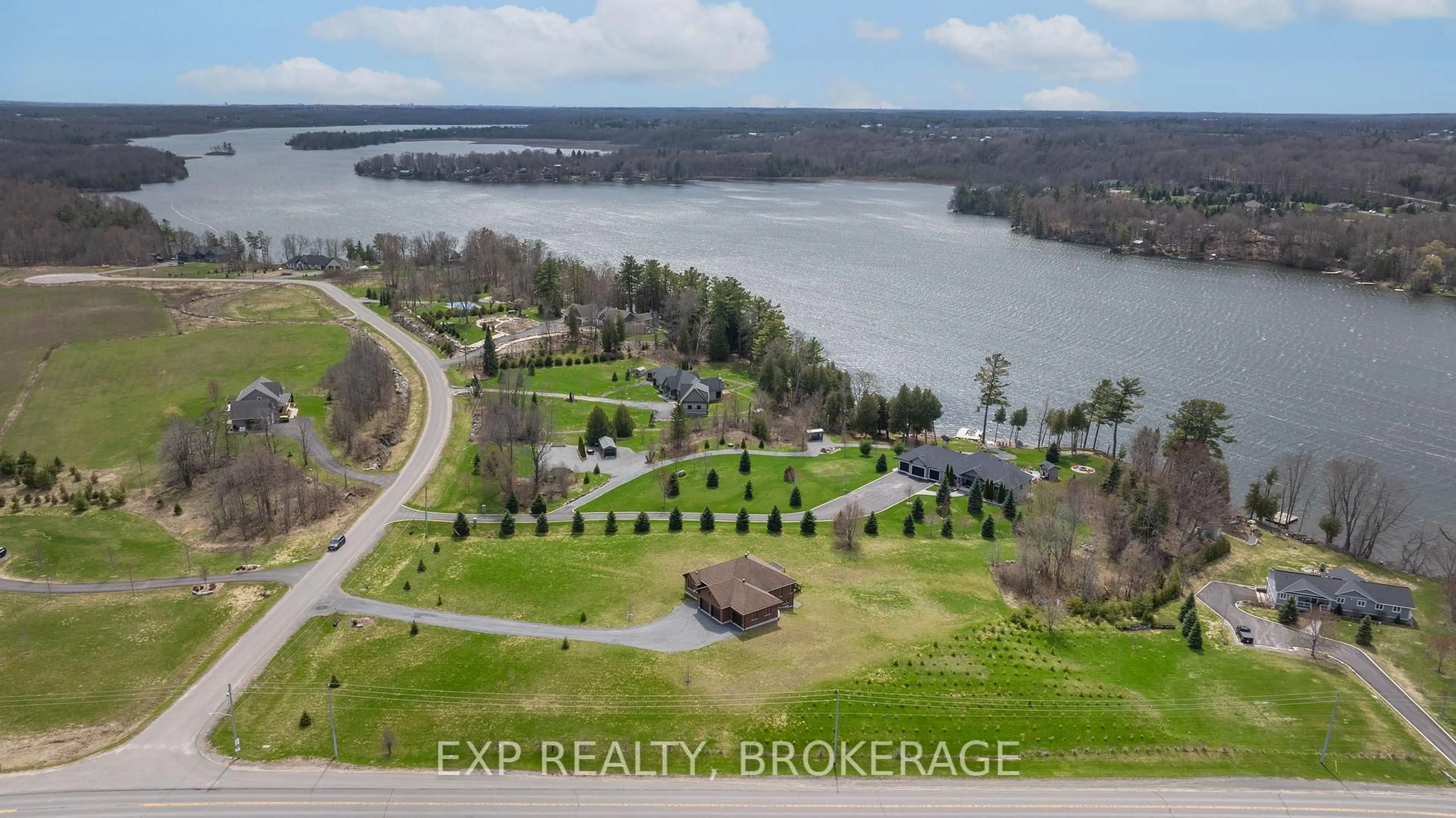 A pic from outside/outdoor area/front of a property/back of a property/a pic from drone, water/lake/river/ocean view for 4 Sandstone Crt, Battersea Ontario K0H 1H0