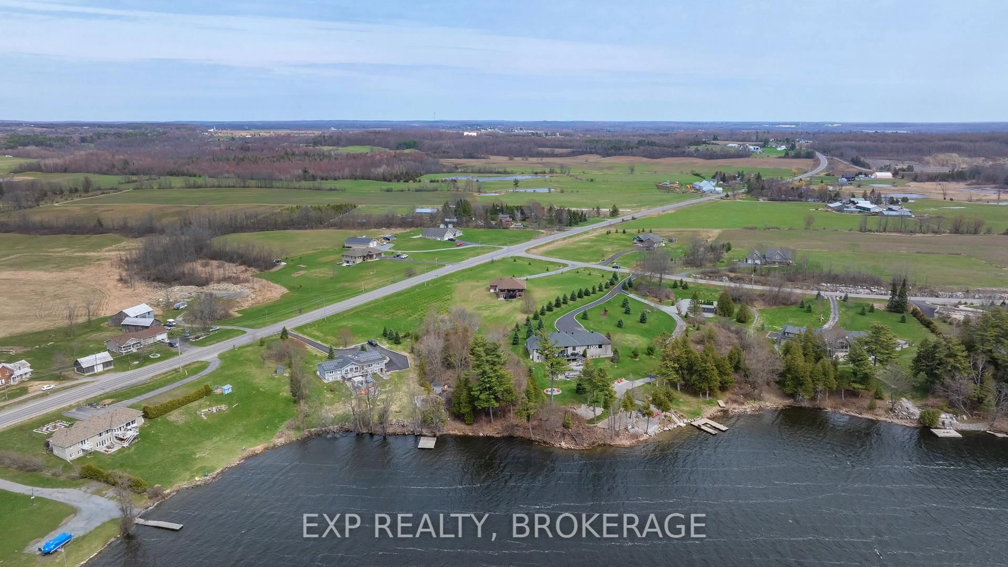 A pic from outside/outdoor area/front of a property/back of a property/a pic from drone, water/lake/river/ocean view for 4 Sandstone Crt, Battersea Ontario K0H 1H0
