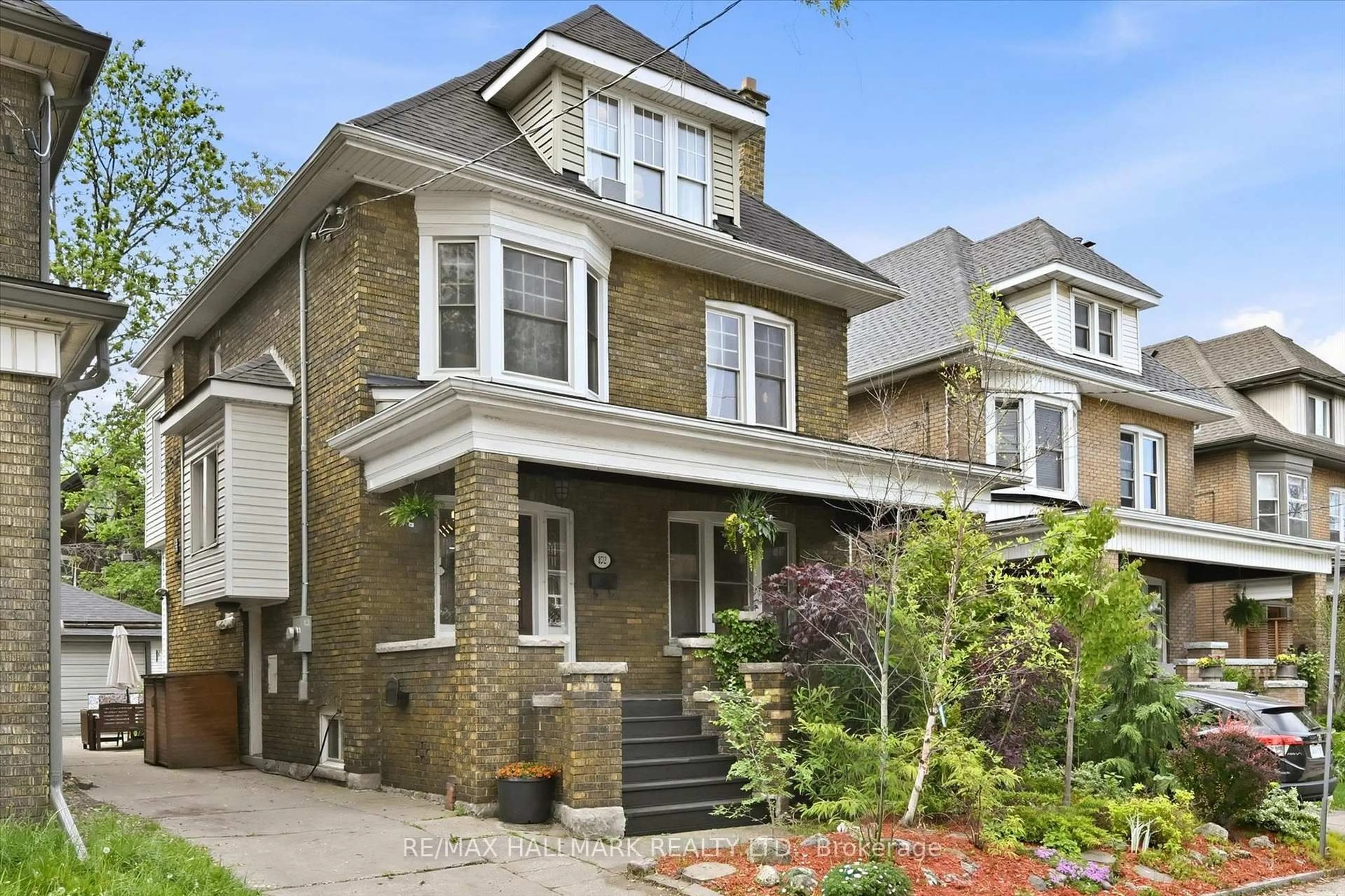 Home with brick exterior material, street for 102 Carrick Ave, Hamilton Ontario L8M 2W6