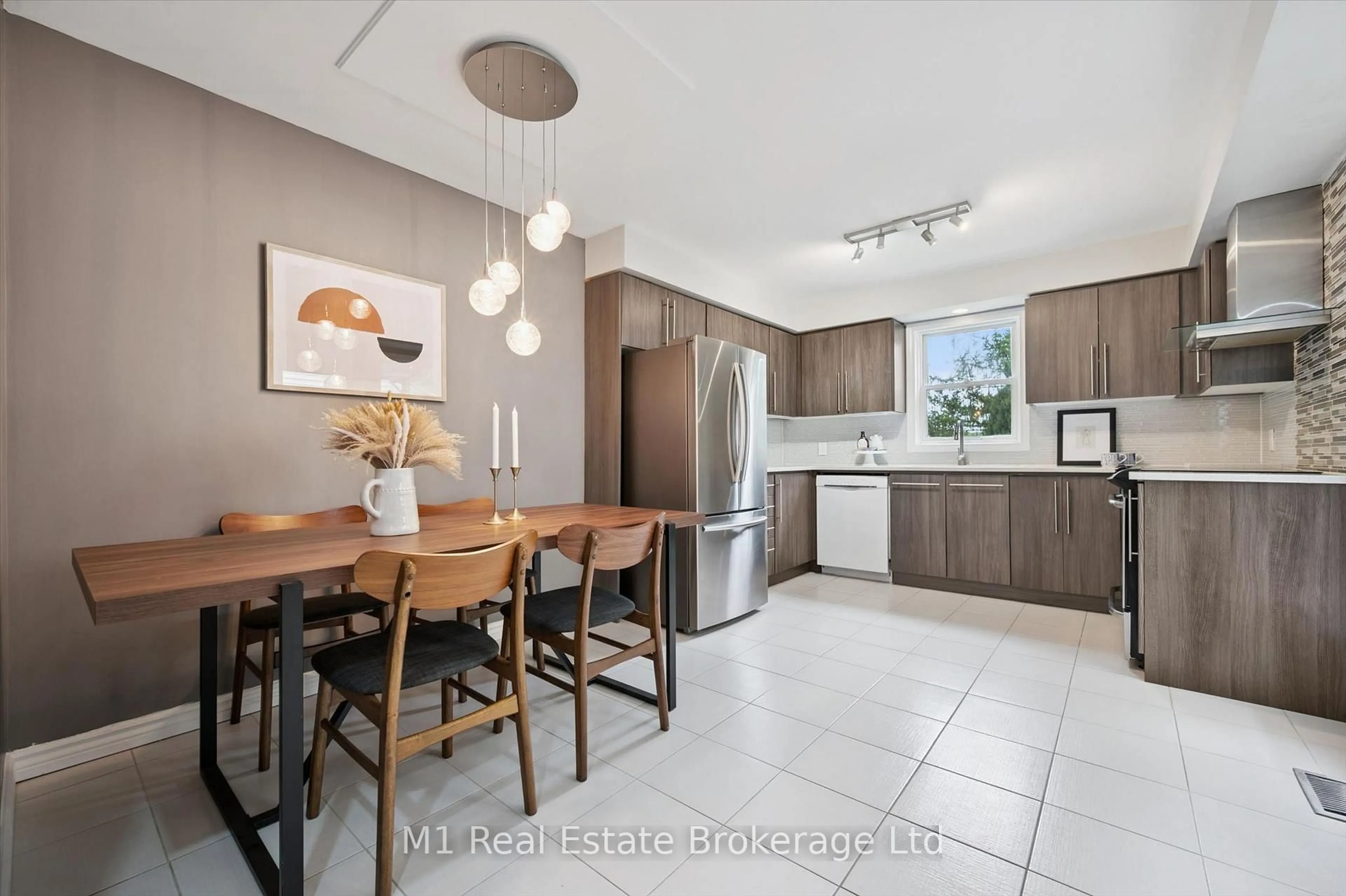 Open concept kitchen, ceramic/tile floor for 668 Jacob Lane, Waterloo Ontario N2V 2G9