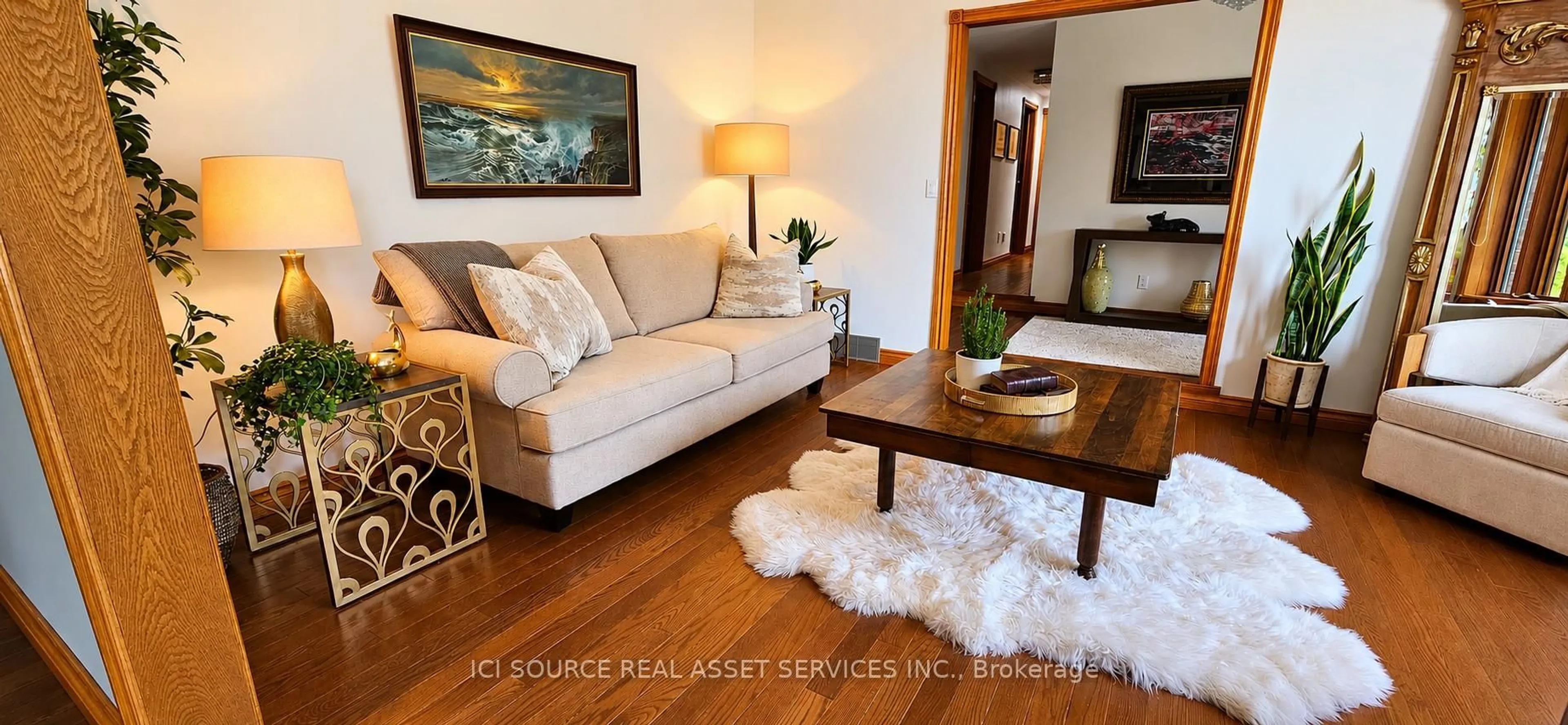 Living room with furniture, wood/laminate floor for 23 Willcox St, Chatham-Kent Ontario N7M 6E2