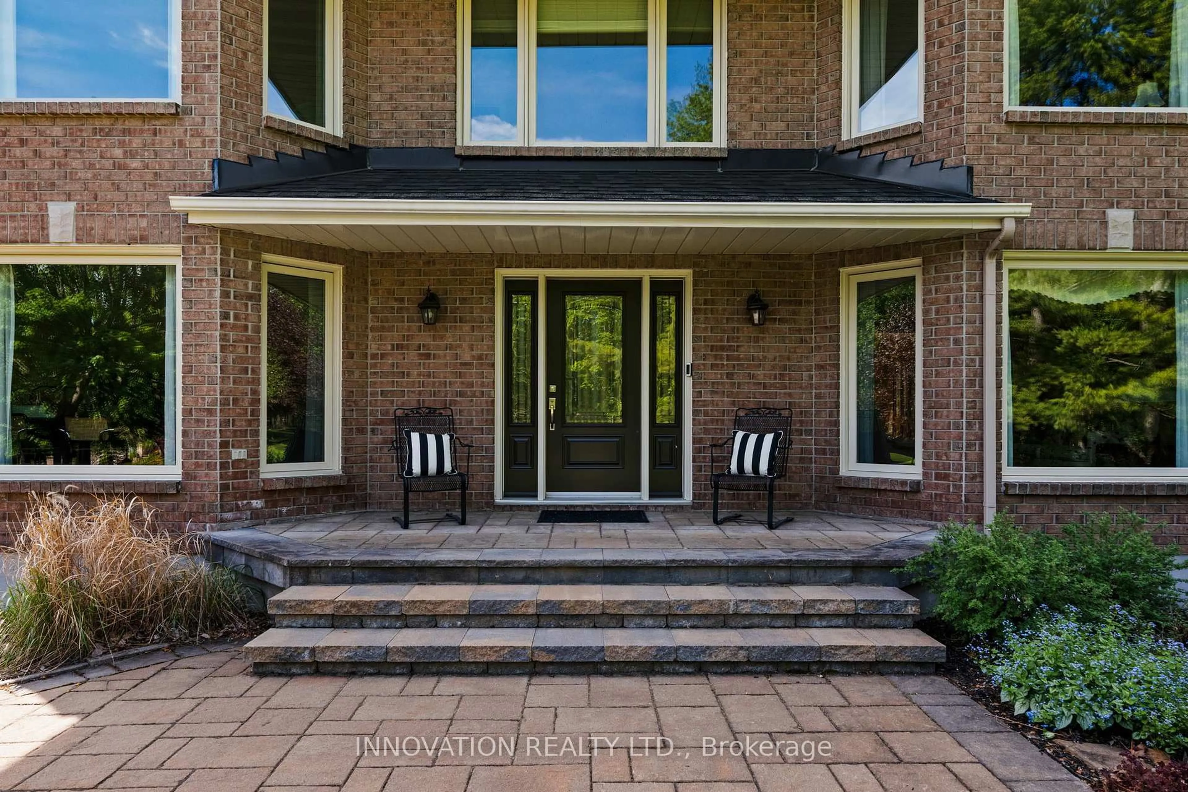 Home with brick exterior material, street for 1410 Sherruby Way, Kanata Ontario K2W 1B1