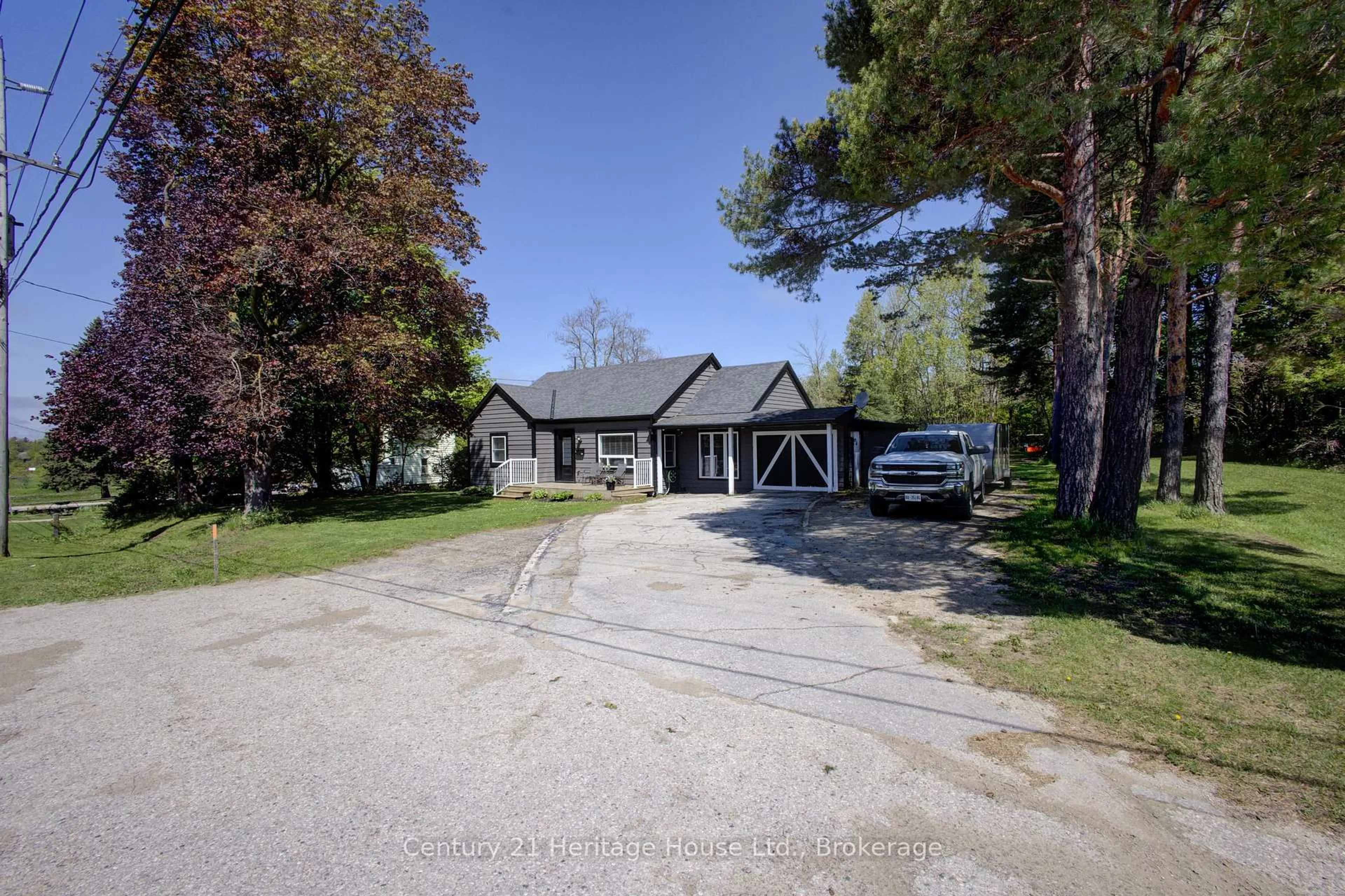 A pic from outside/outdoor area/front of a property/back of a property/a pic from drone, street for 508 Durham Rd, West Grey Ontario N0G 1R0