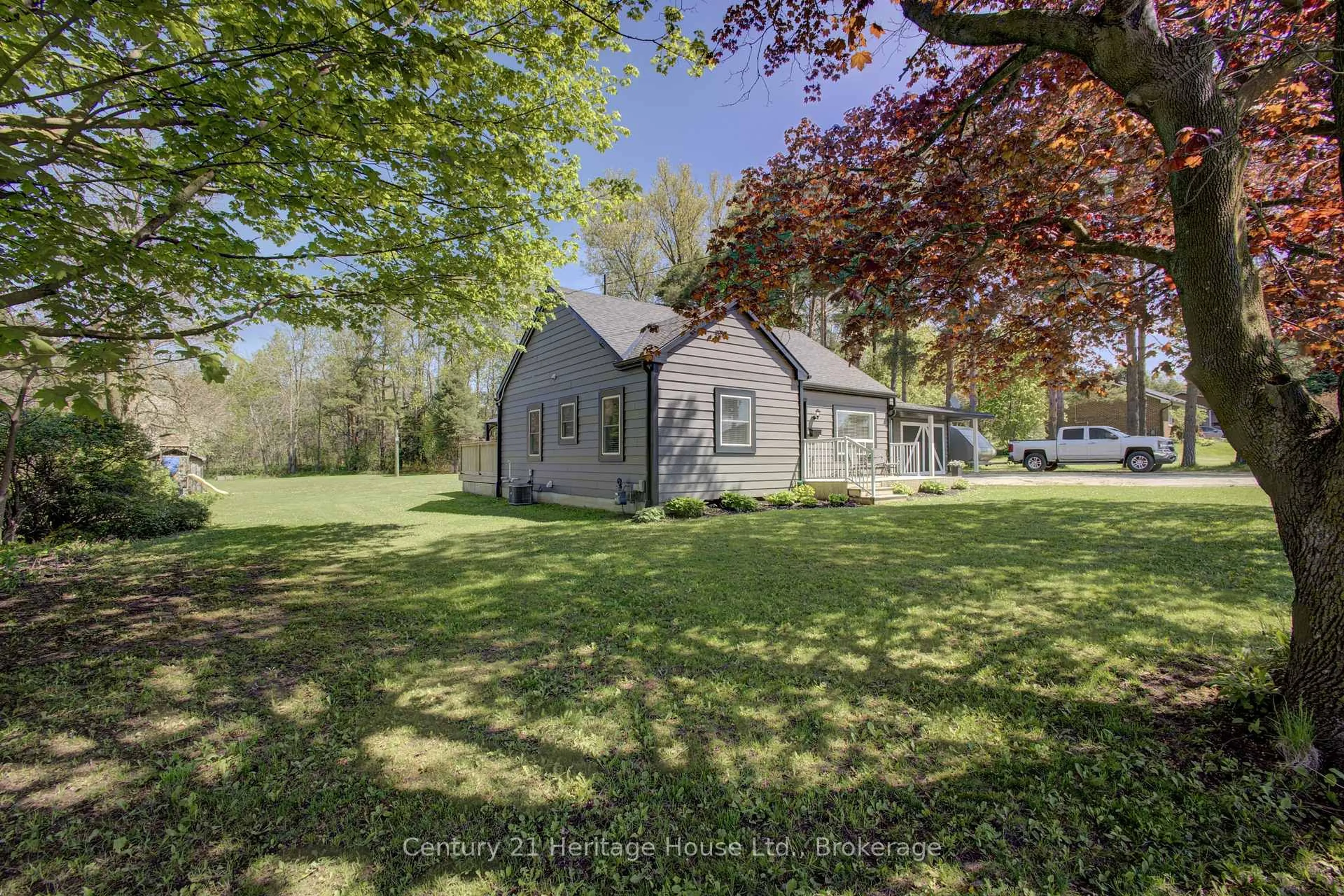 A pic from outside/outdoor area/front of a property/back of a property/a pic from drone, street for 508 Durham Rd, West Grey Ontario N0G 1R0