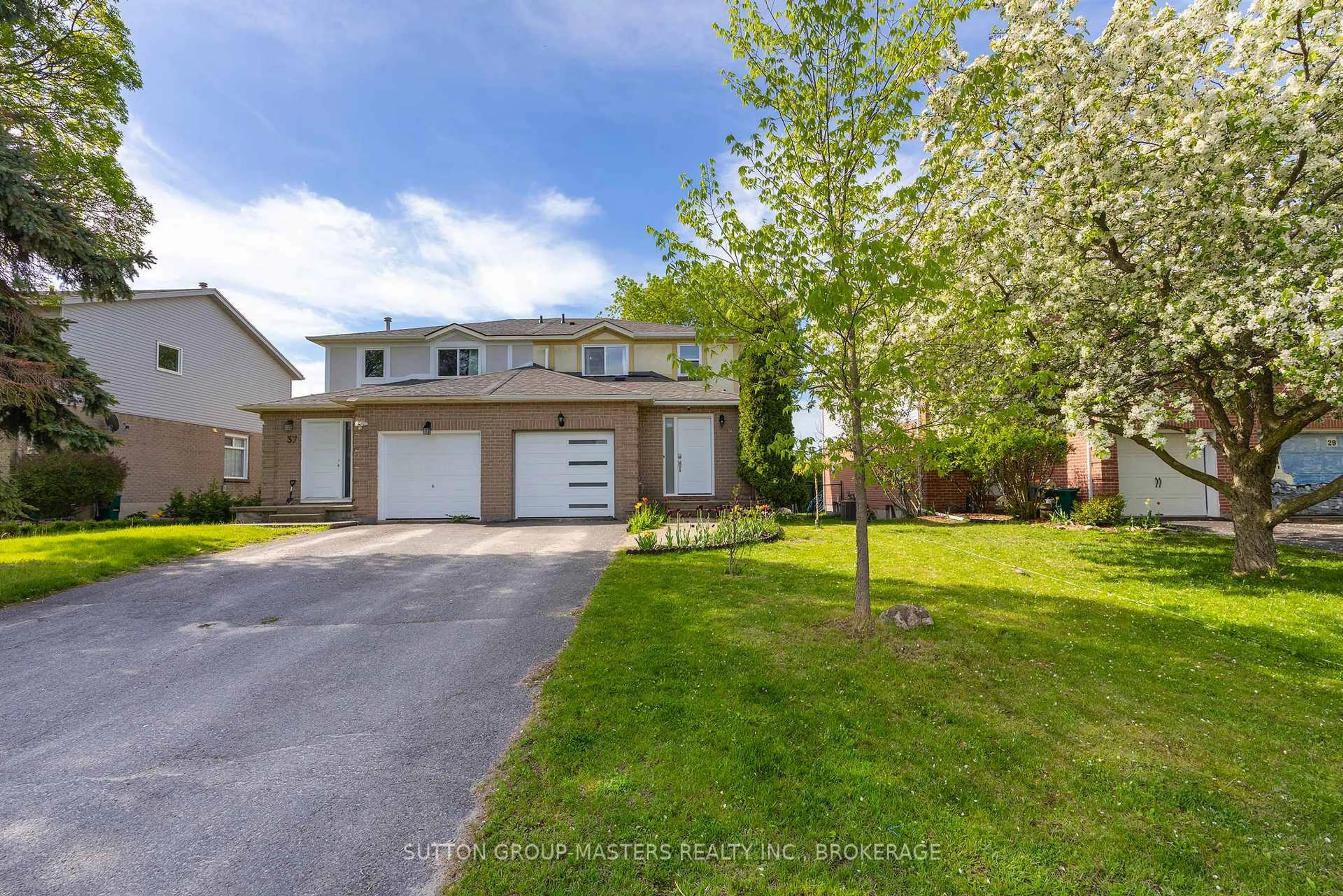 A pic from outside/outdoor area/front of a property/back of a property/a pic from drone, street for 35 Rose Abbey Dr, Kingston Ontario K7K 6W1