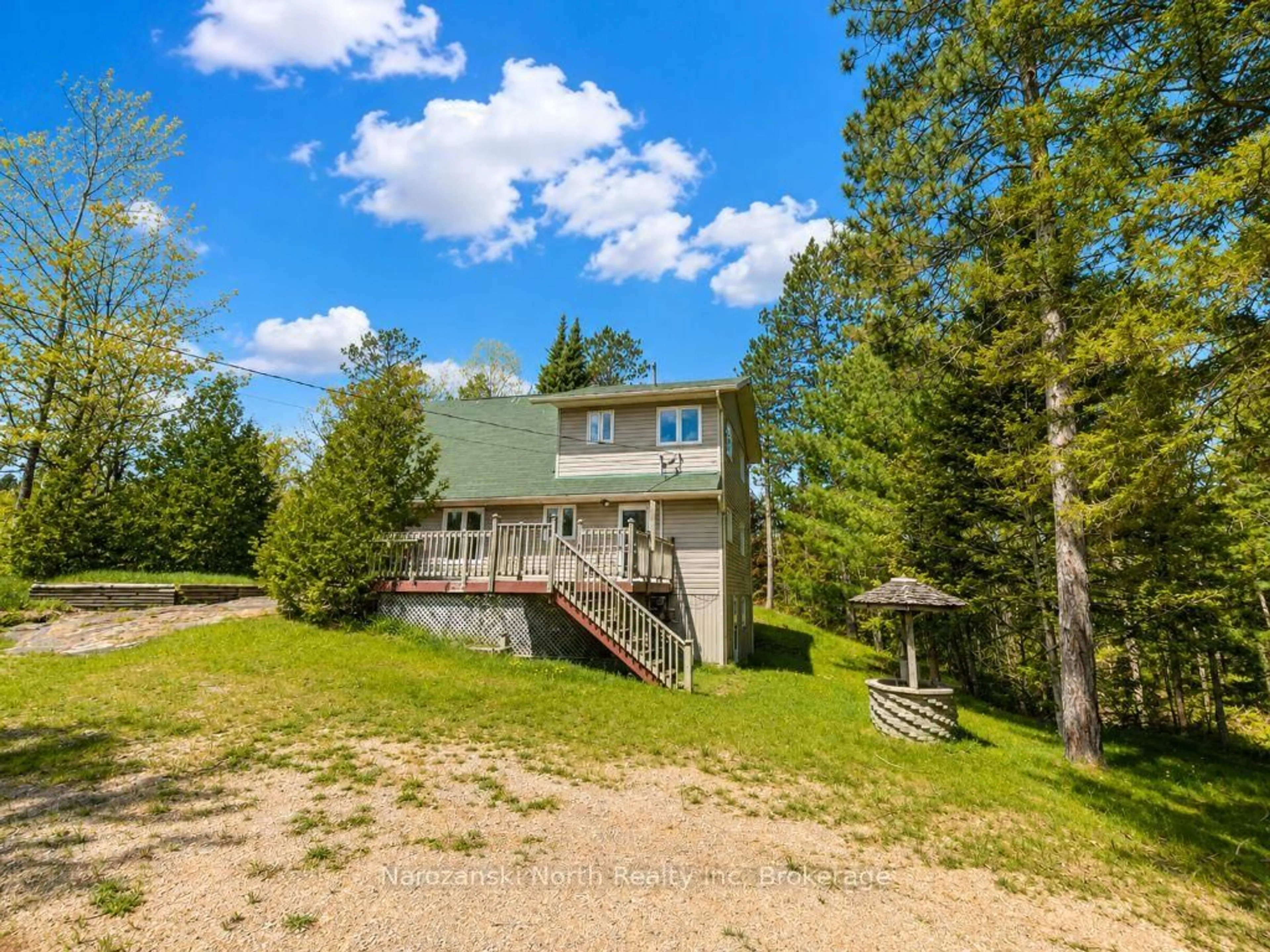 A pic from outside/outdoor area/front of a property/back of a property/a pic from drone, unknown for 6051 Hwy 64, French River Ontario P0M 2N0