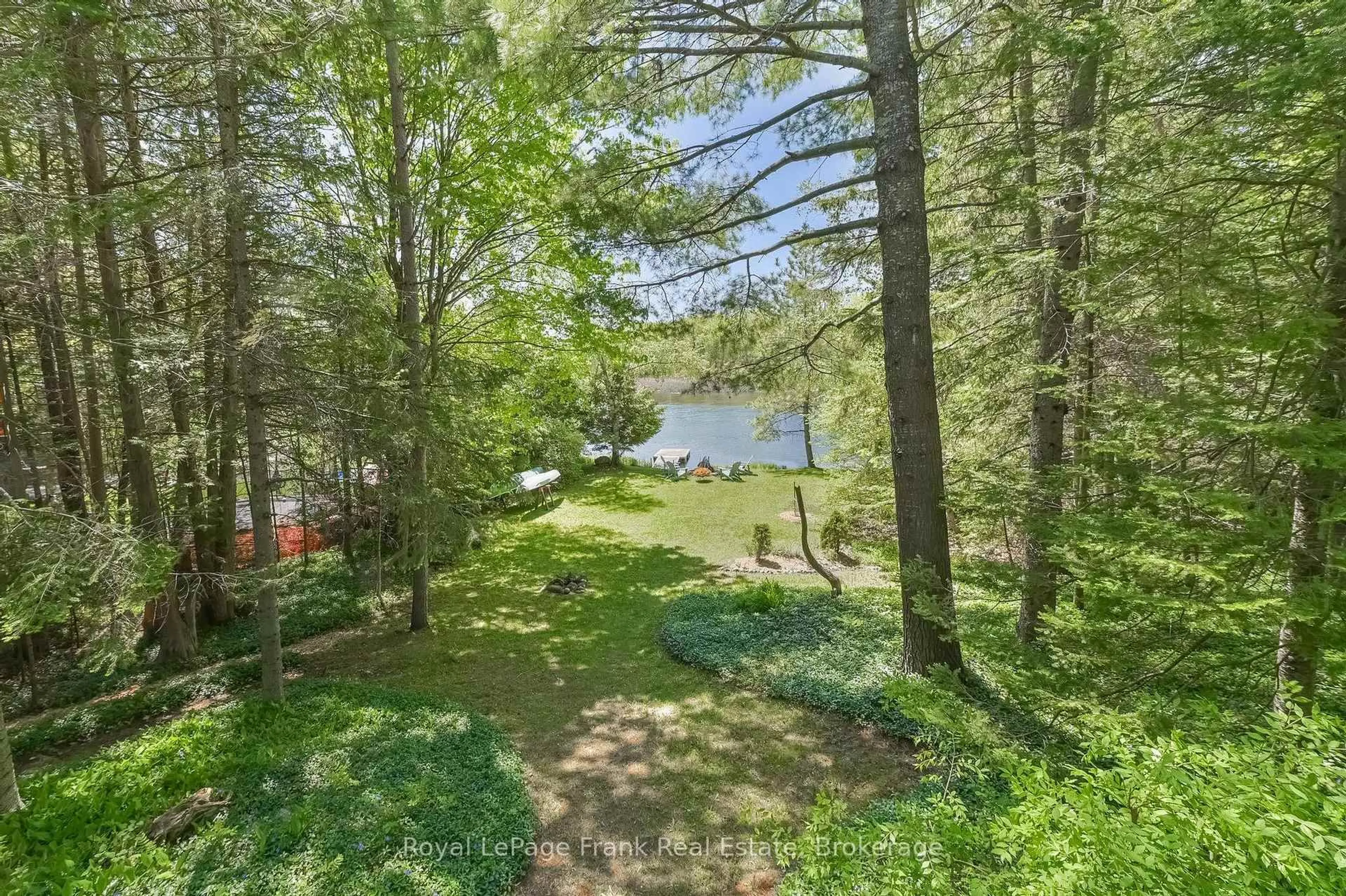 A pic from outside/outdoor area/front of a property/back of a property/a pic from drone, water/lake/river/ocean view for 59 Grantsville Tr, Trent Lakes Ontario K0L 1J0