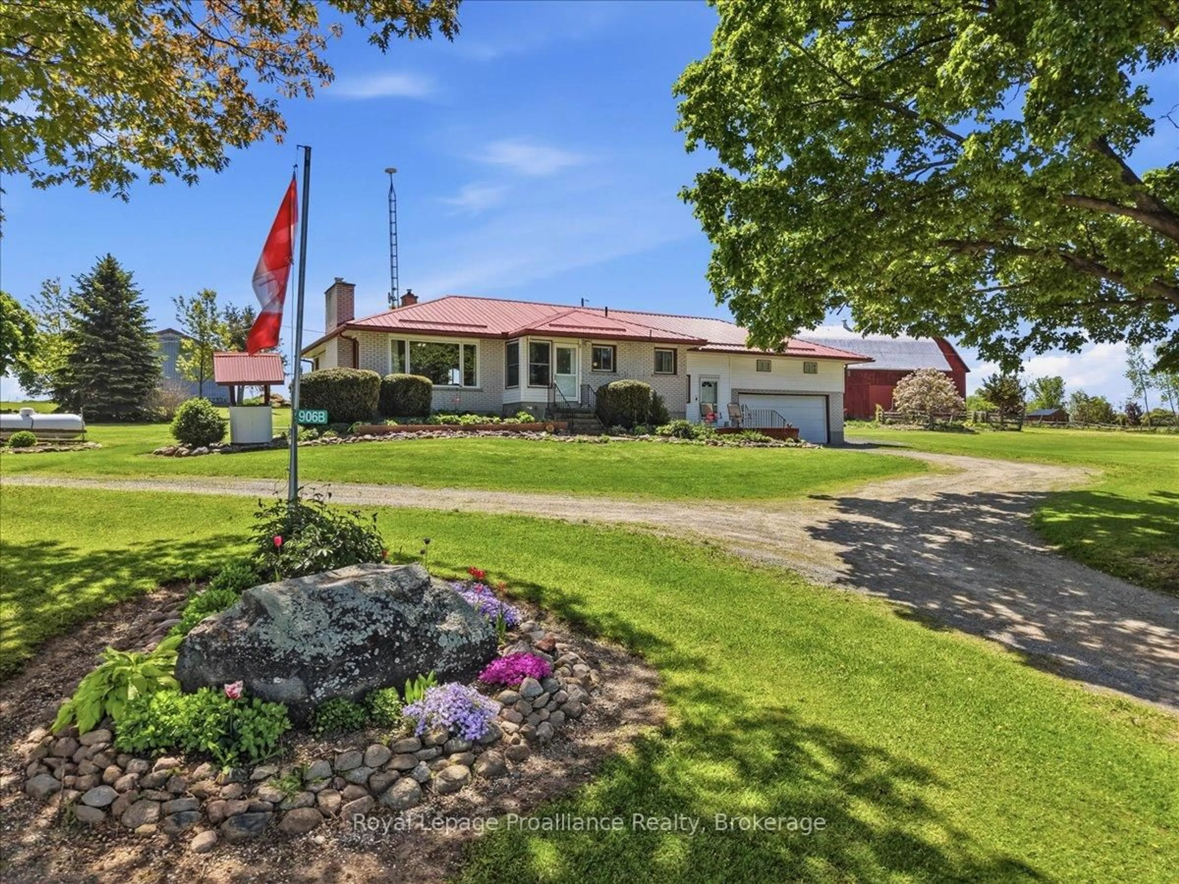 A pic from outside/outdoor area/front of a property/back of a property/a pic from drone, street for 906 N Big Island Rd, Prince Edward County Ontario K0K 1W0