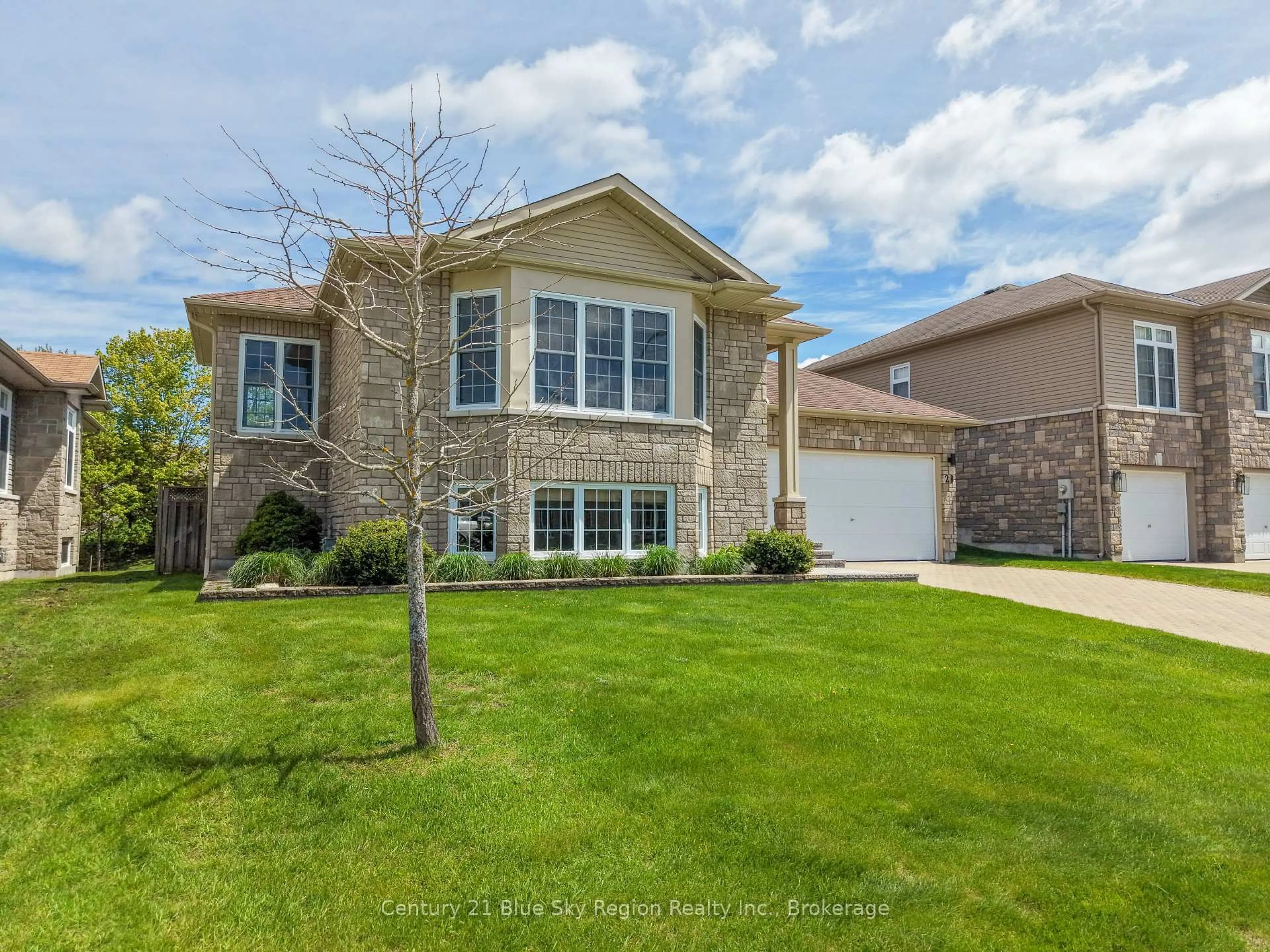 Home with brick exterior material, street for 28 Stone Manor Dr, North Bay Ontario P1C 0A3