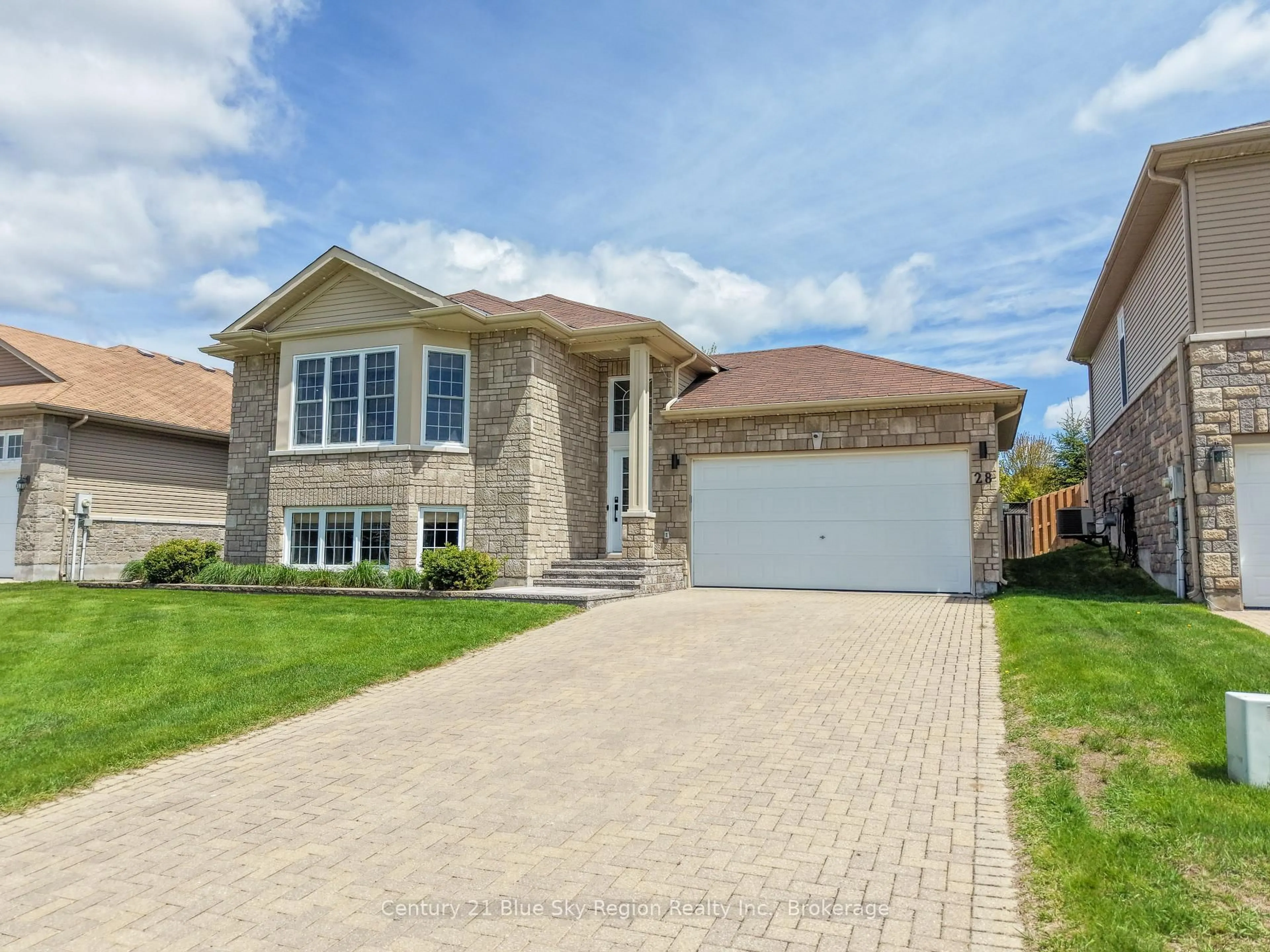 Home with brick exterior material, street for 28 Stone Manor Dr, North Bay Ontario P1C 0A3