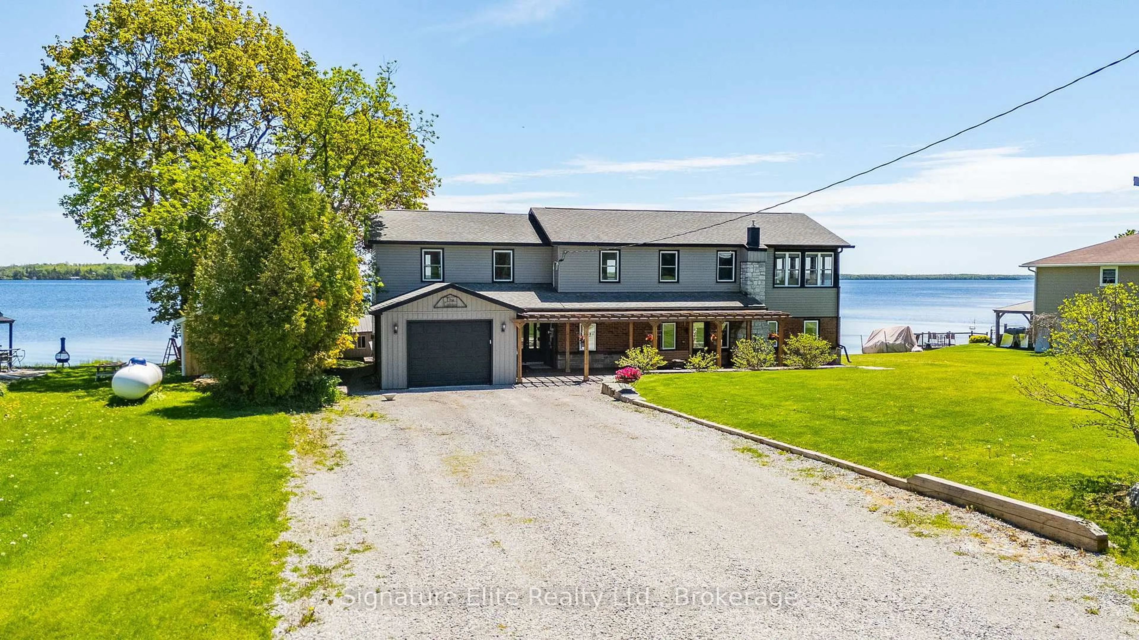 A pic from outside/outdoor area/front of a property/back of a property/a pic from drone, water/lake/river/ocean view for 9 Fieldview Dr, Kawartha Lakes Ontario K0M 2B0