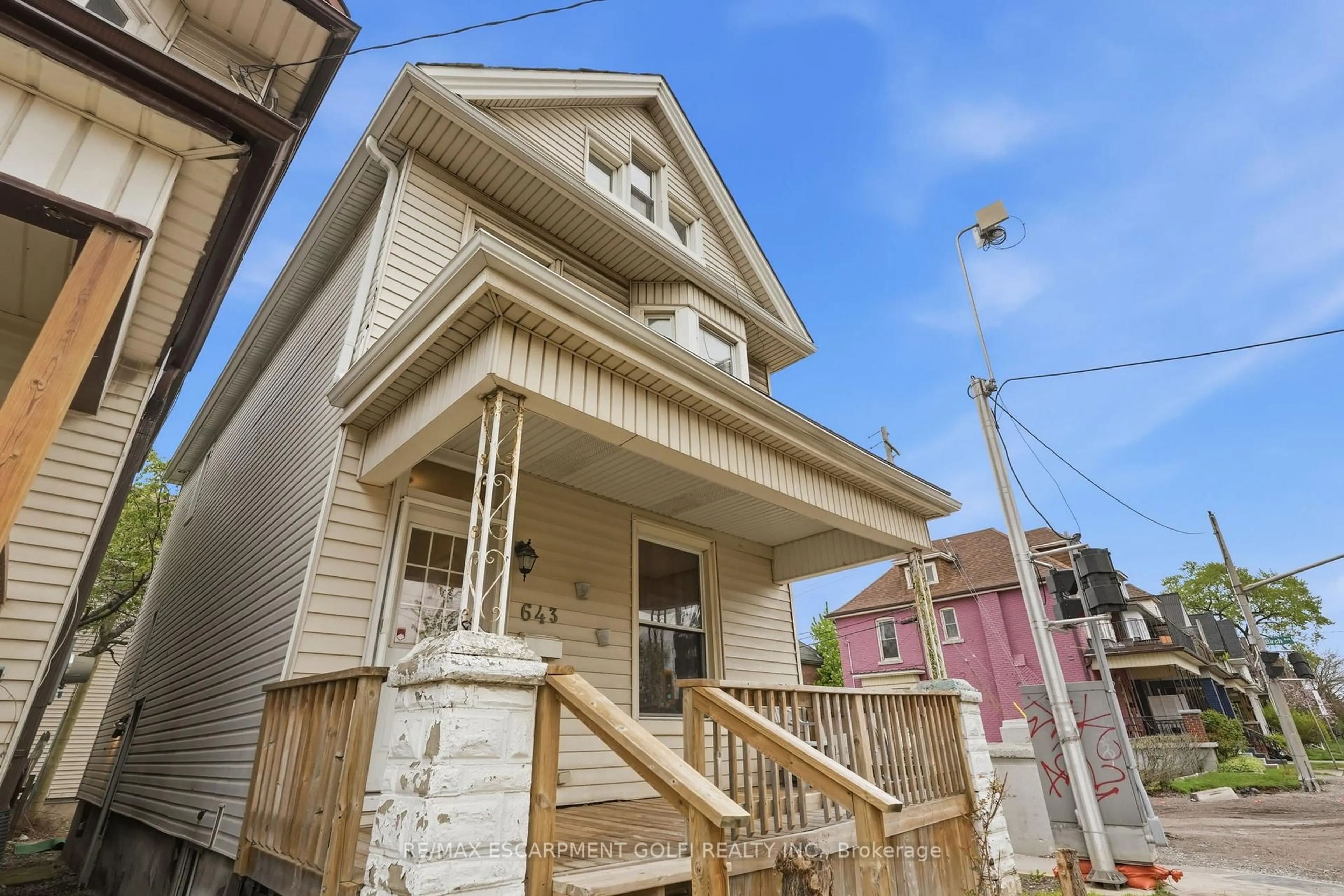 Home with vinyl exterior material, street for 643 Wilson St, Hamilton Ontario L8L 1V2