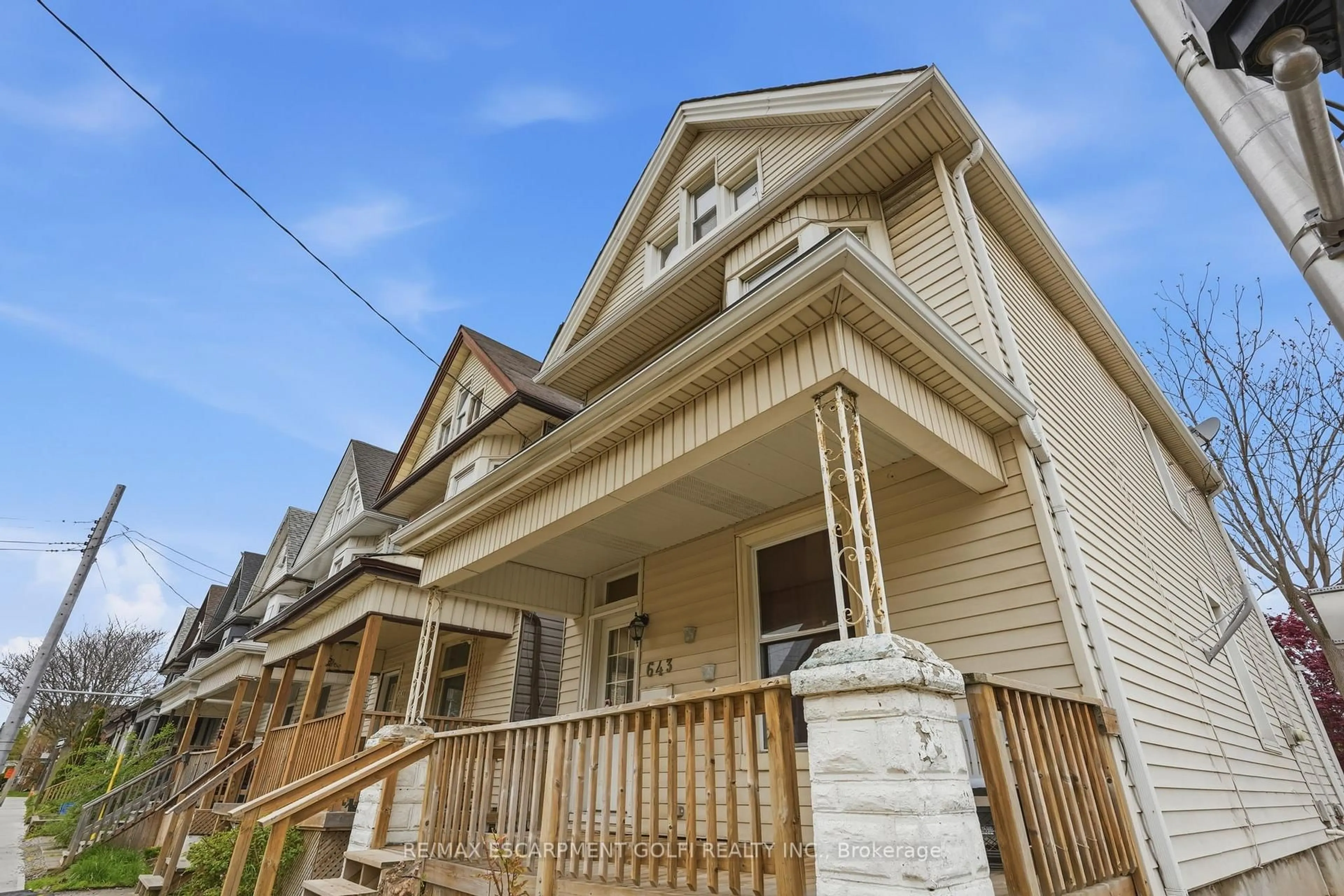 Home with vinyl exterior material, street for 643 Wilson St, Hamilton Ontario L8L 1V2