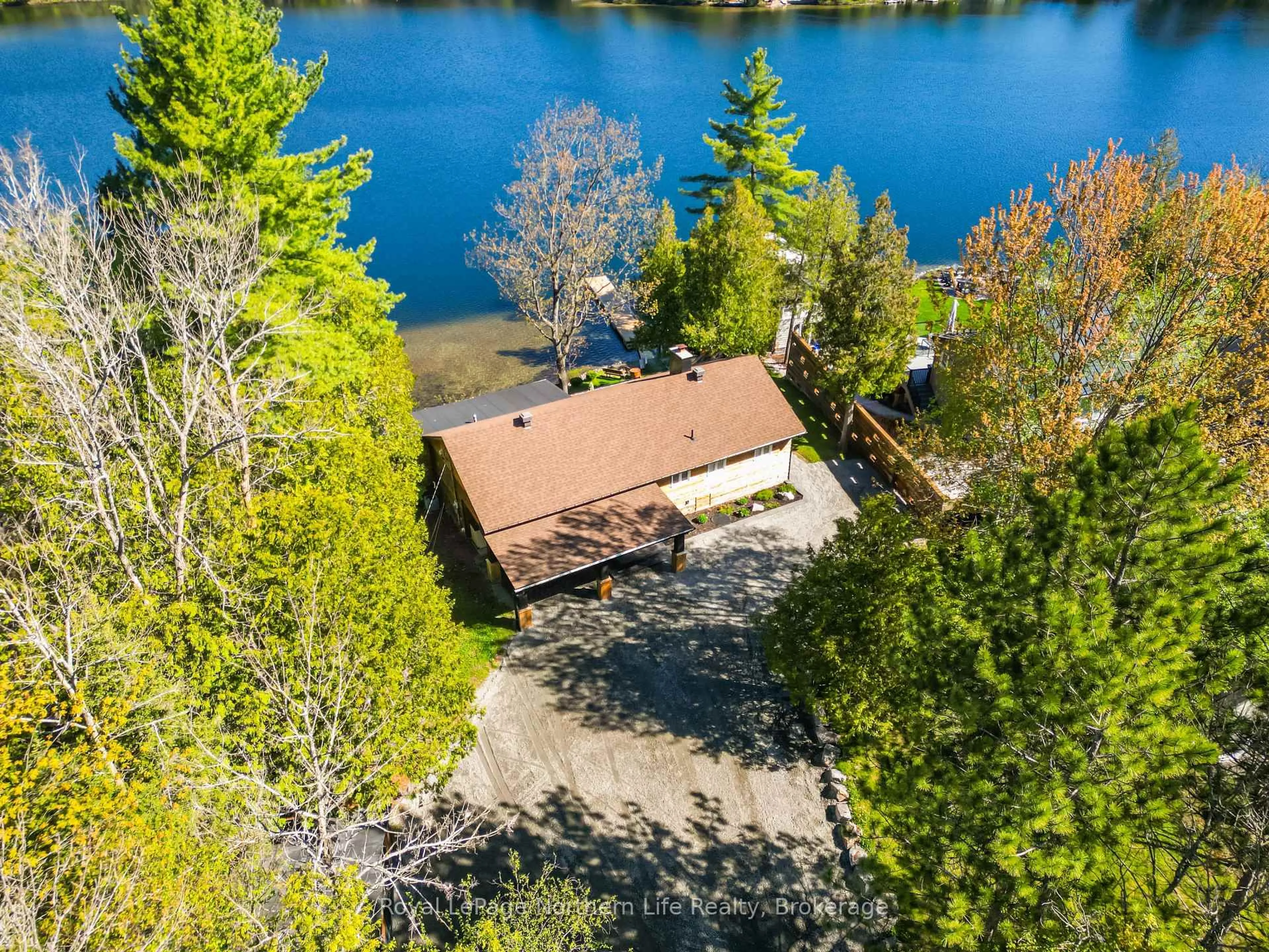 A pic from outside/outdoor area/front of a property/back of a property/a pic from drone, water/lake/river/ocean view for 131 West Peninsula Rd, North Bay Ontario P1B 8G4