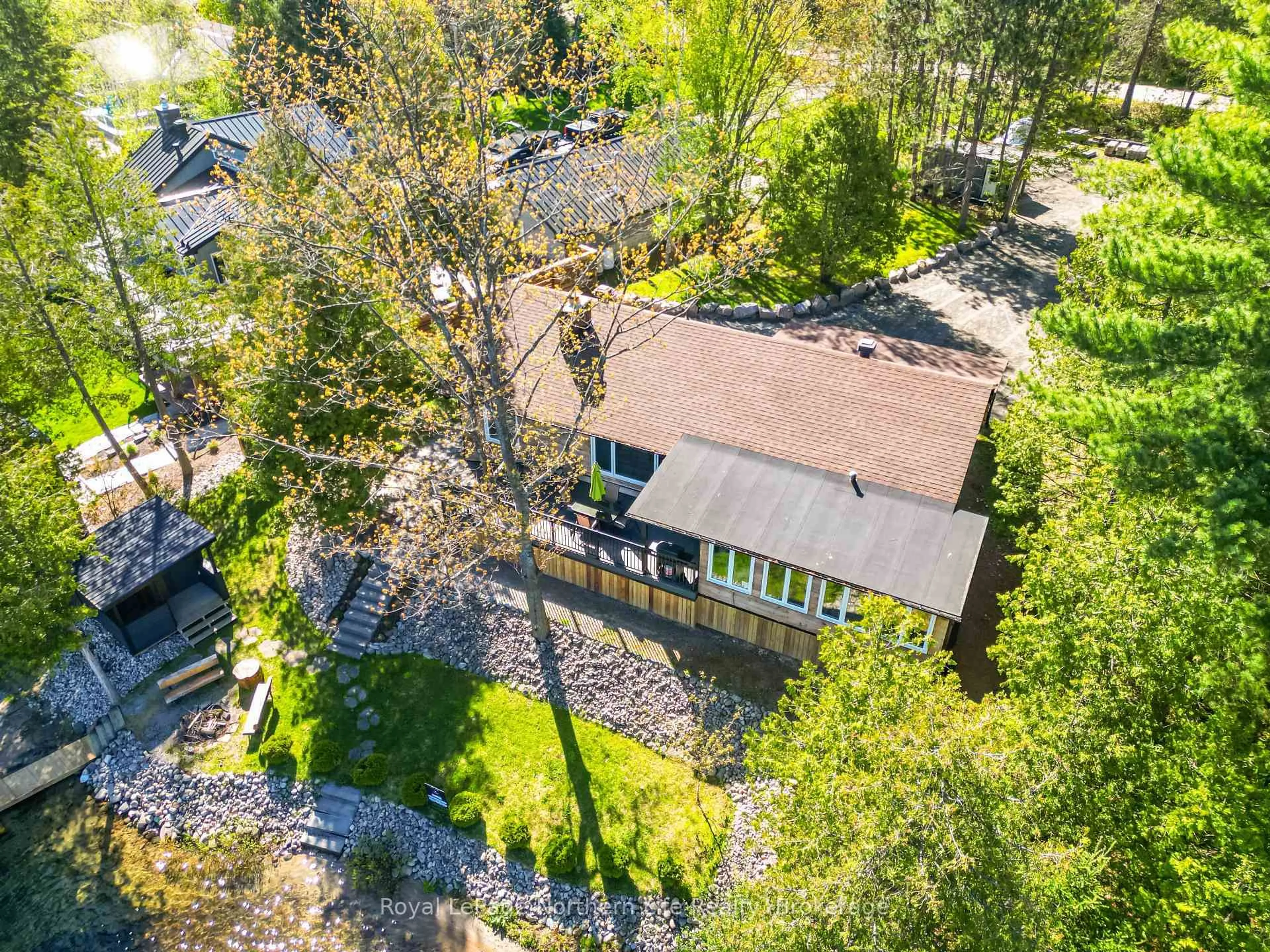 A pic from outside/outdoor area/front of a property/back of a property/a pic from drone, street for 131 West Peninsula Rd, North Bay Ontario P1B 8G4