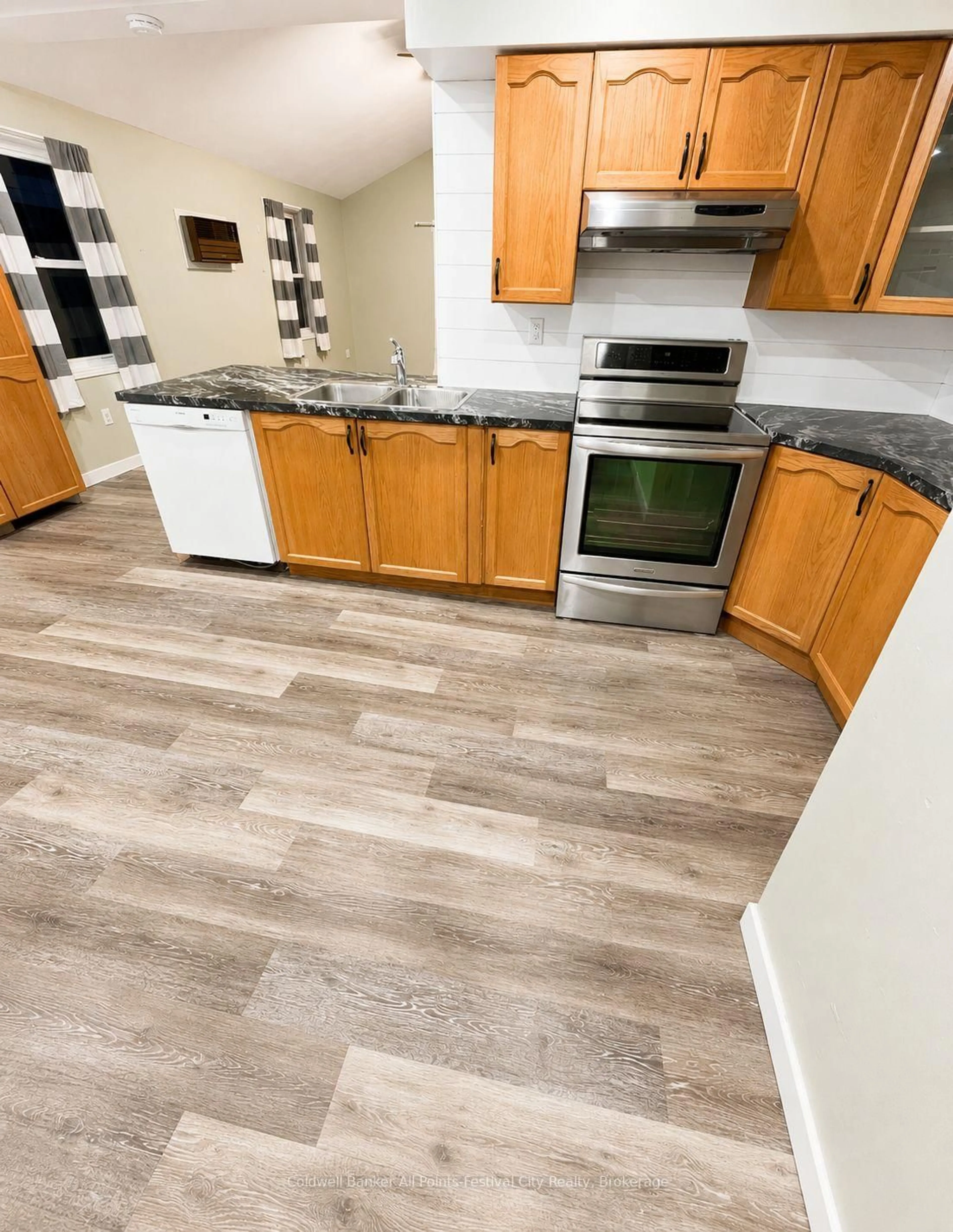 Open concept kitchen, ceramic/tile floor for 100 John St, North Huron Ontario N0G 2W0
