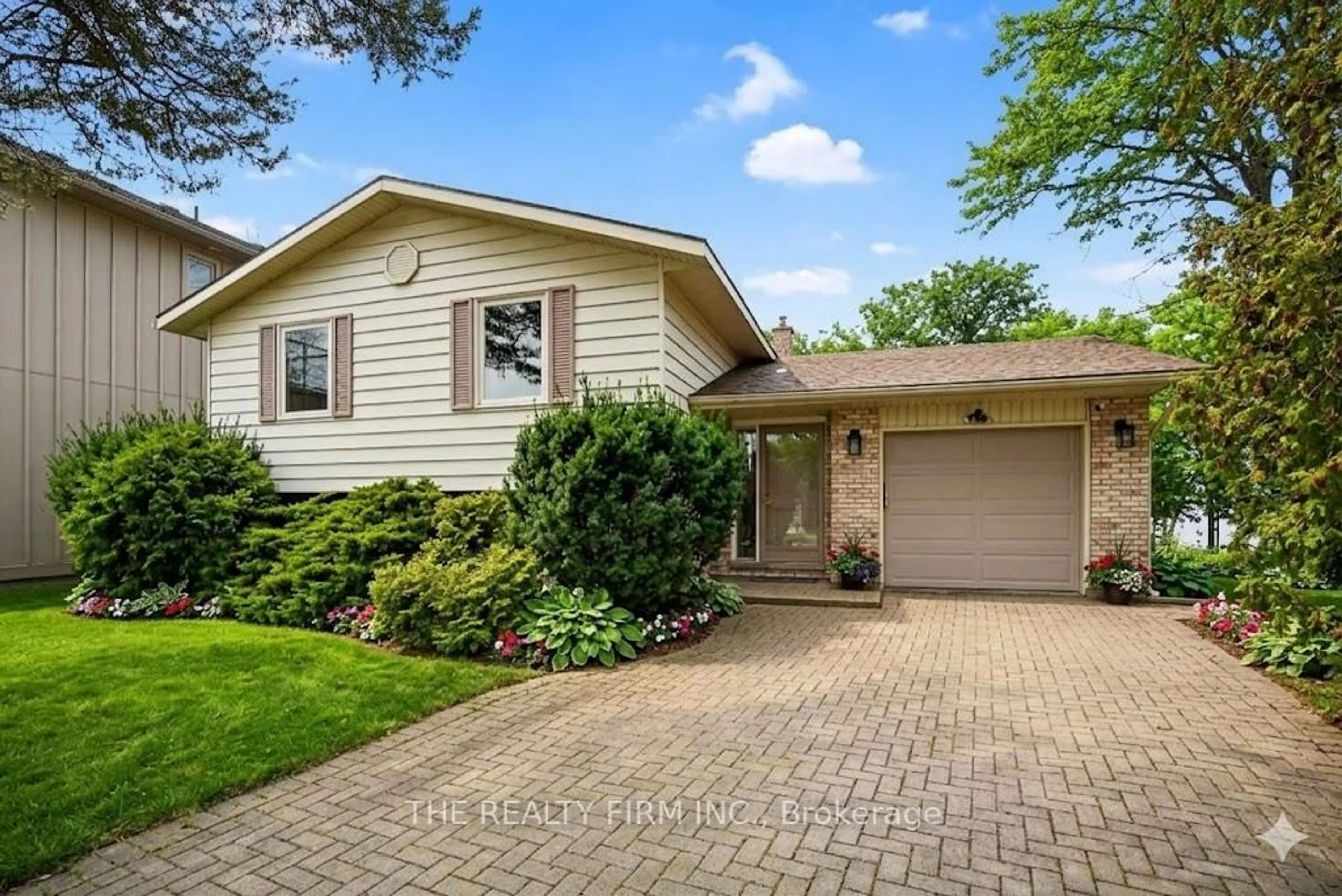 Home with vinyl exterior material, street for 4084 Bluepoint Dr, Plympton-Wyoming Ontario N0N 1J6
