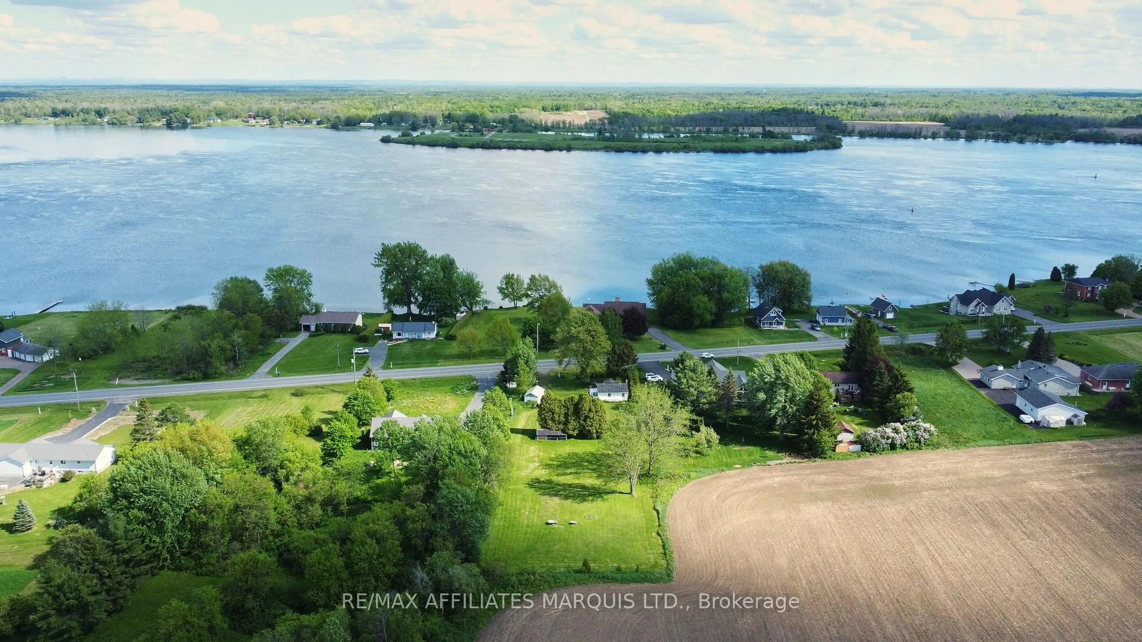 A pic from outside/outdoor area/front of a property/back of a property/a pic from drone, water/lake/river/ocean view for 11481 Lakeshore Dr, South Dundas Ontario K0E 1K0