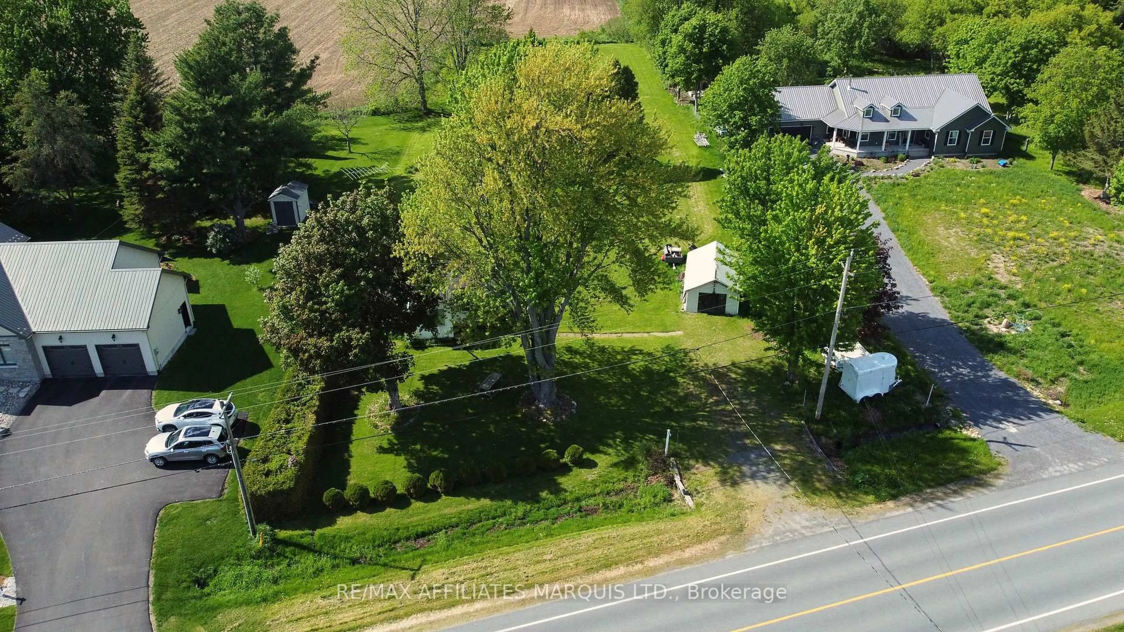 A pic from outside/outdoor area/front of a property/back of a property/a pic from drone, street for 11481 Lakeshore Dr, South Dundas Ontario K0E 1K0