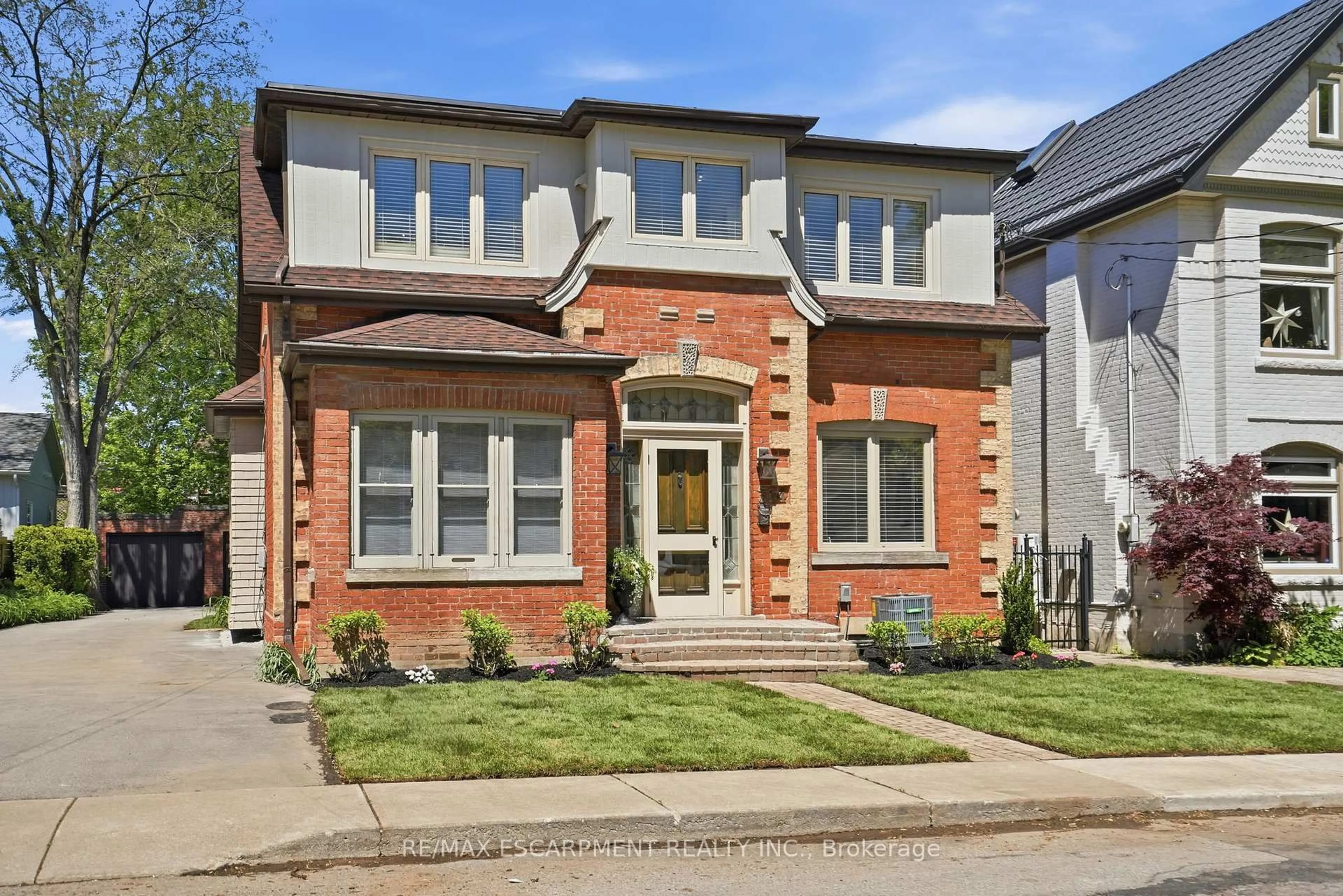 Home with brick exterior material, street for 314 Hess St, Hamilton Ontario L8P 3P8