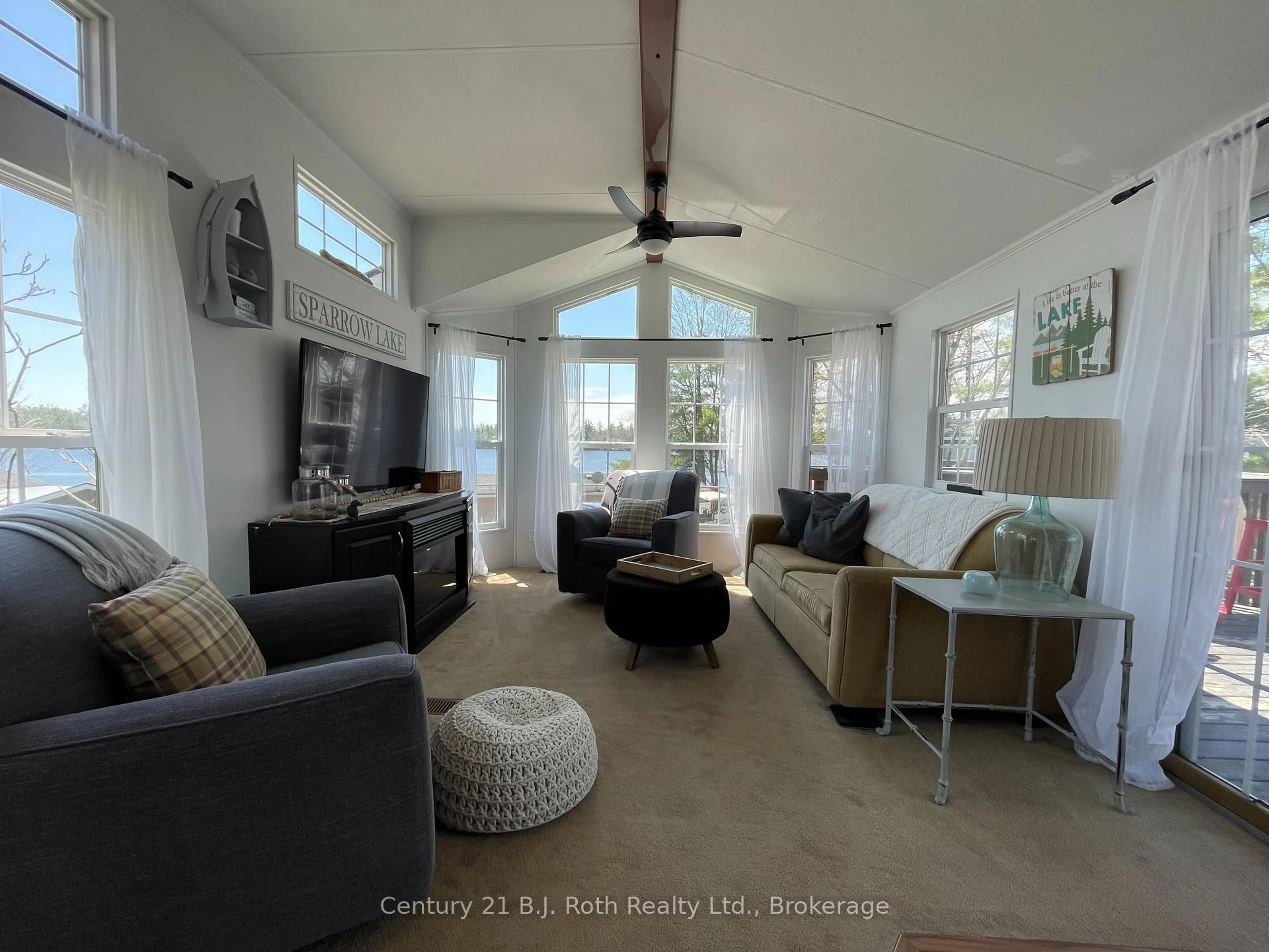 Living room with furniture, unknown for 1336 South Morrison Lake Rd #12 Marina Way, Gravenhurst Ontario P0E 1G0