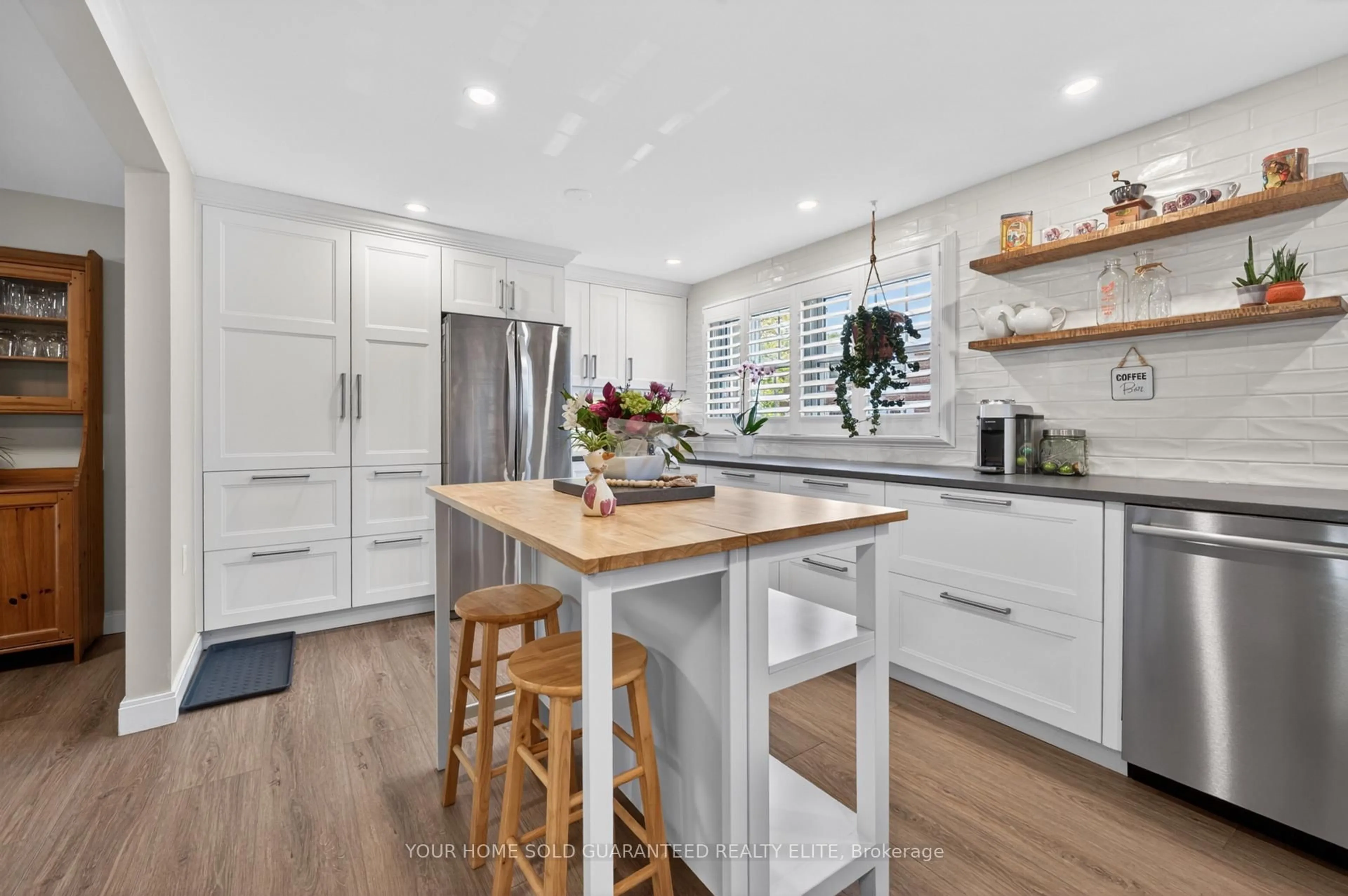 Contemporary kitchen, wood/laminate floor for 91 Livingston Ave #4, Grimsby Ontario L3M 1L4