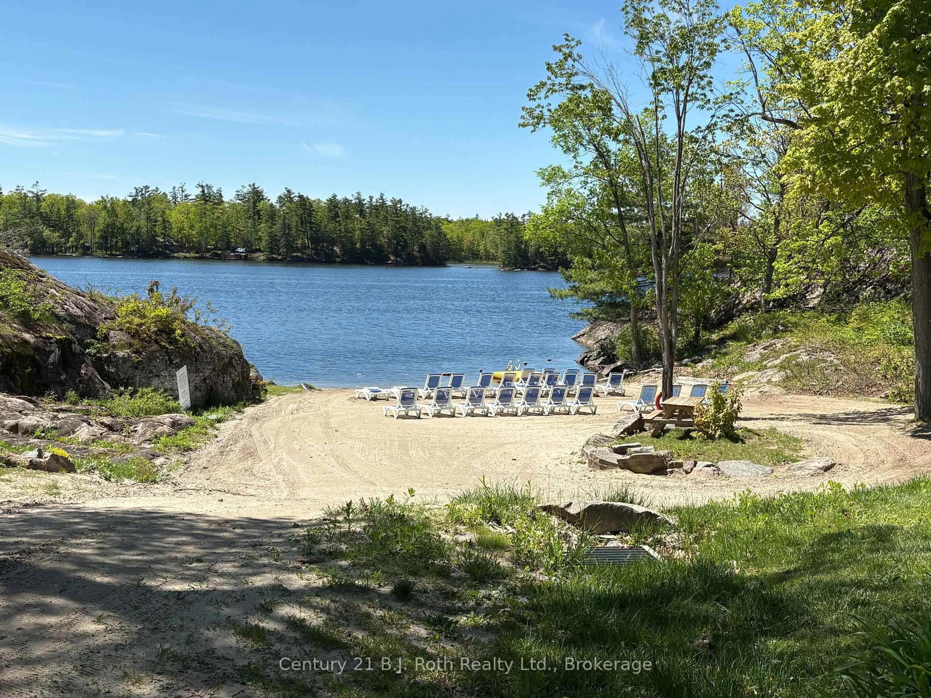 A pic from outside/outdoor area/front of a property/back of a property/a pic from drone, water/lake/river/ocean view for 1336 South Morrison Lake Rd #31 Riverside Village, Gravenhurst Ontario P0E 1N0