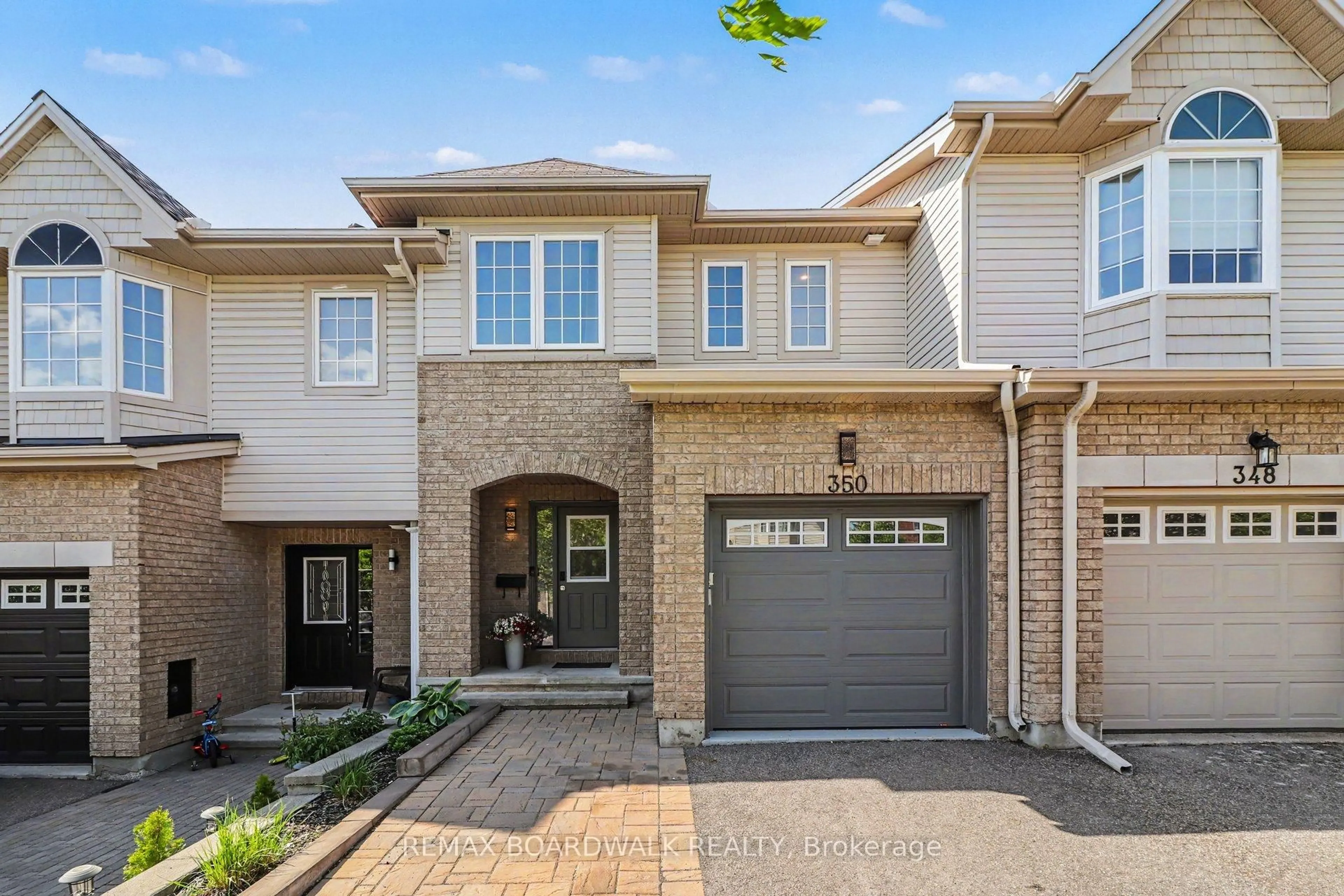 Home with brick exterior material, street for 350 Rolling Meadow Cres, Ottawa Ontario K1W 0A7