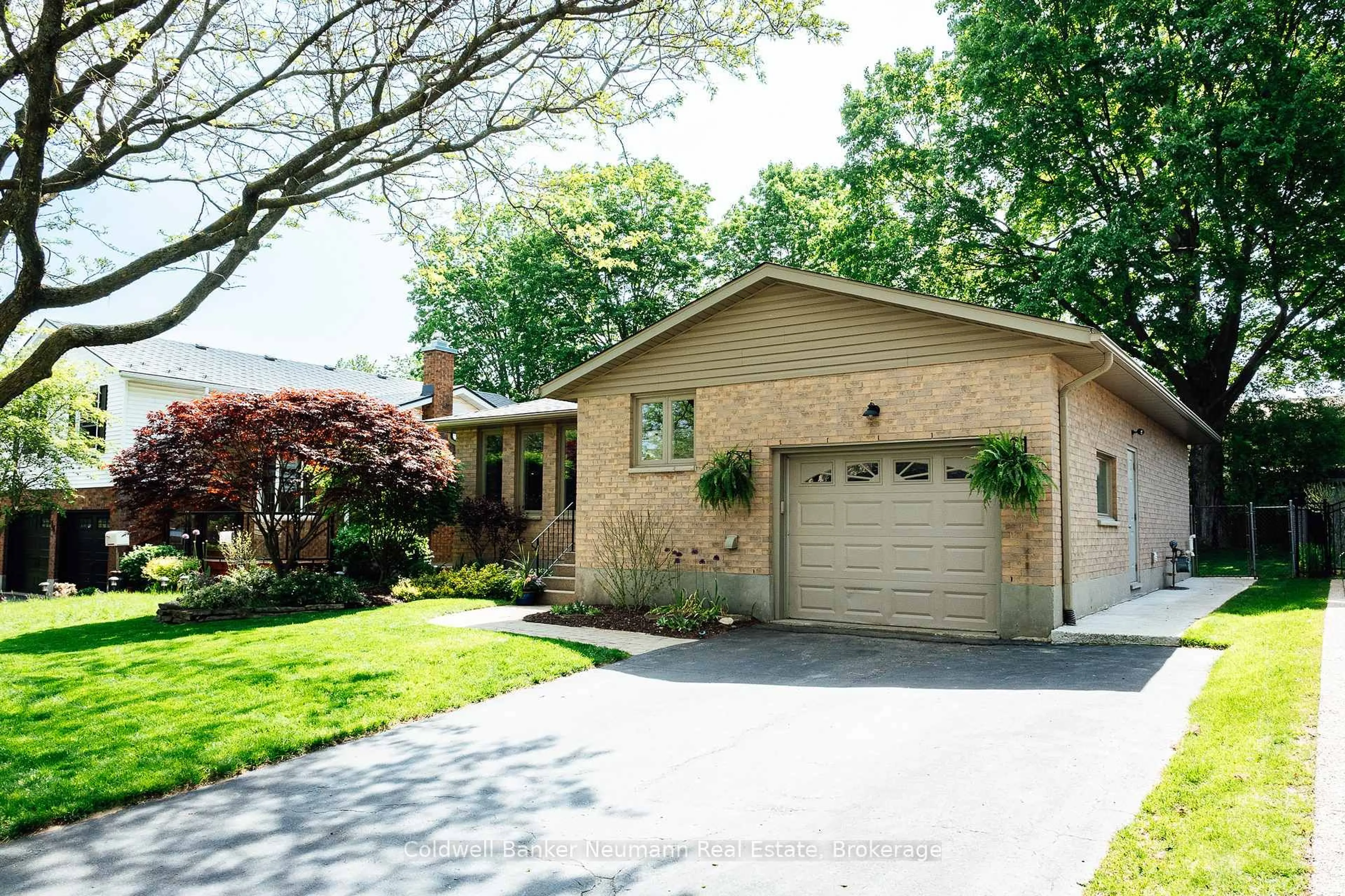 Home with brick exterior material, street for 16 Suzanna Dr, Guelph Ontario N1K 1K4