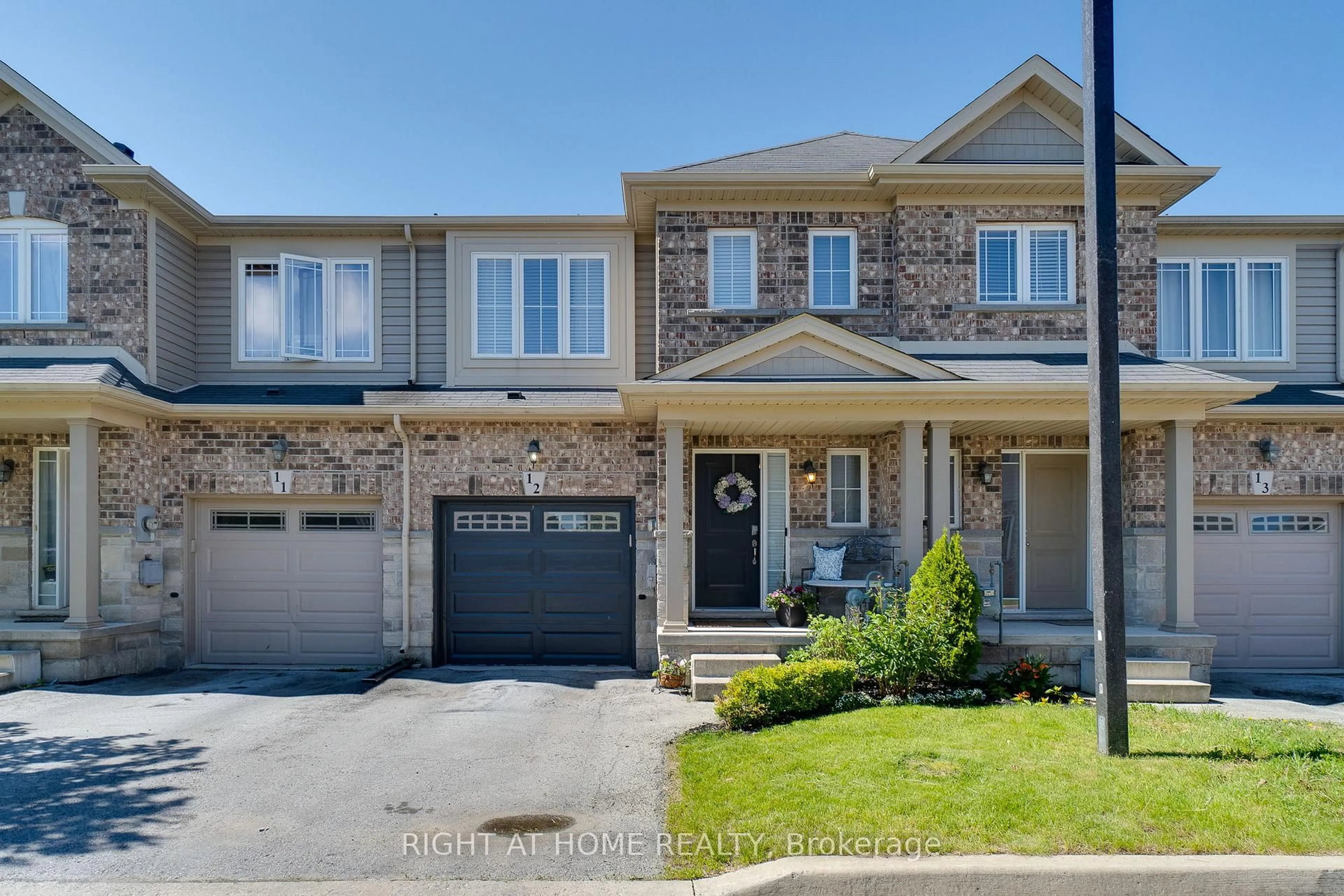 Home with brick exterior material, street for 70 Highgate Dr #12, Hamilton Ontario L8J 0E8