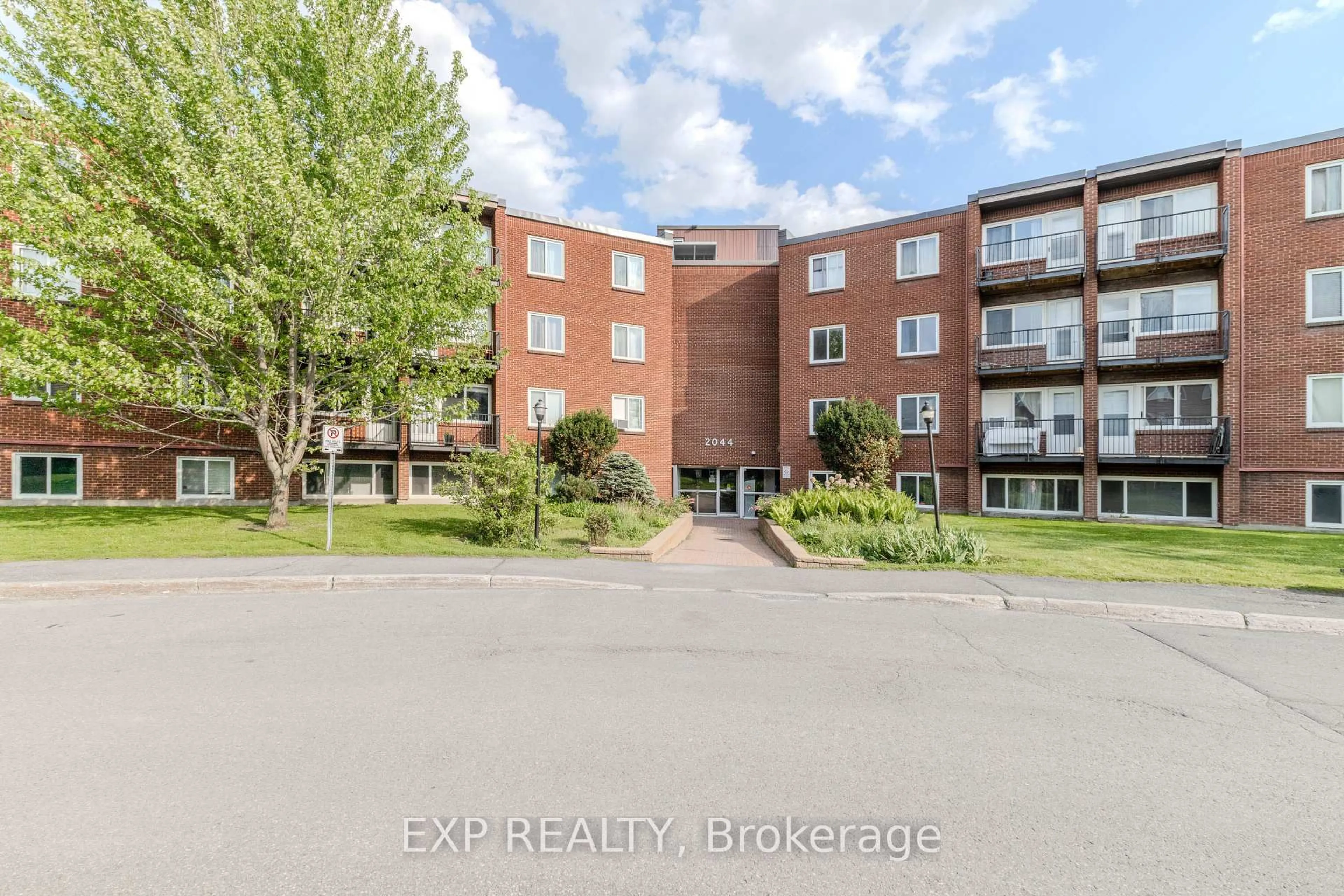 A pic from outside/outdoor area/front of a property/back of a property/a pic from drone, building for 2044 Arrowsmith Dr #404 B, Ottawa Ontario K1J 7V8