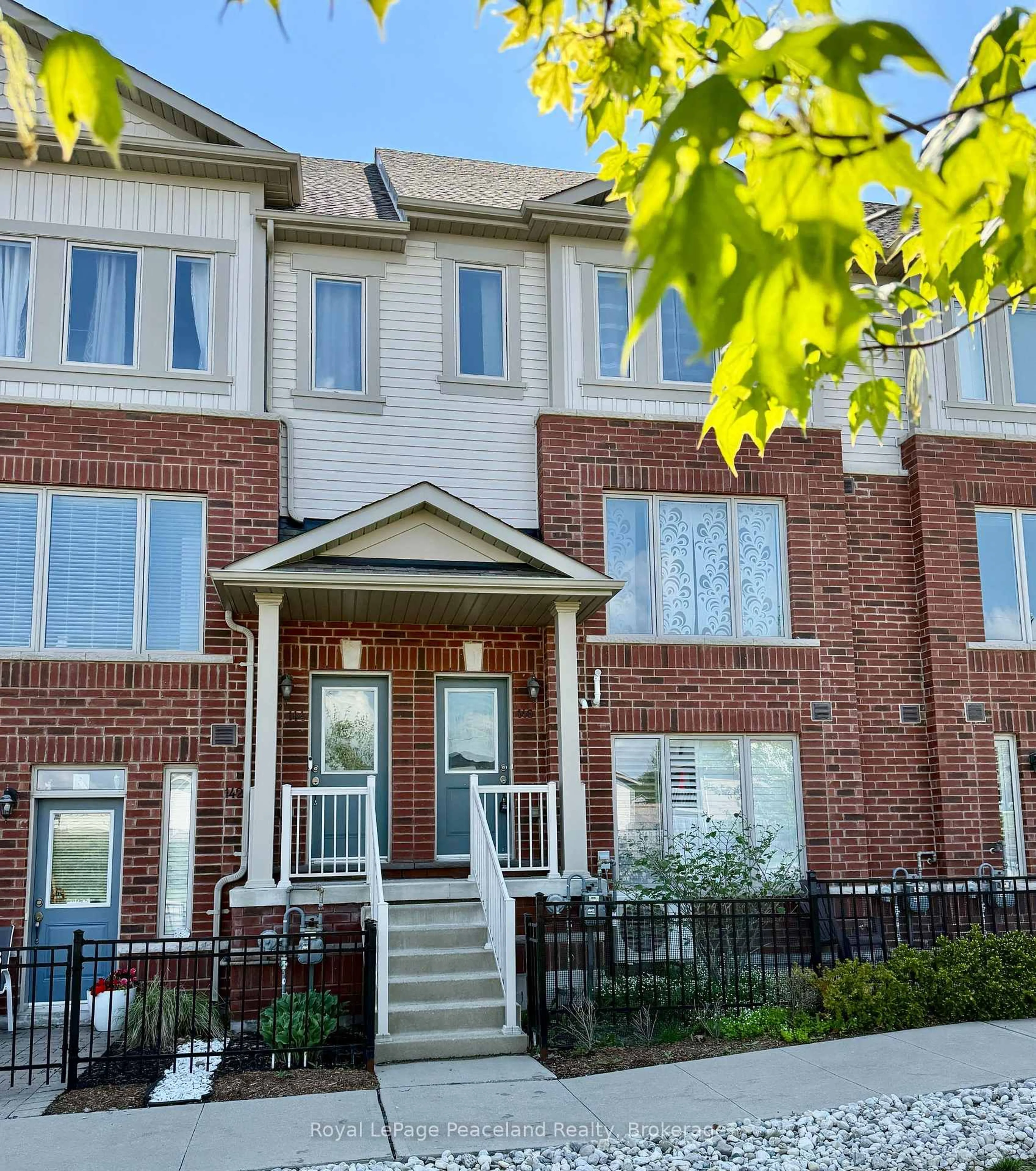 Home with brick exterior material, street for 146 Watson Pkwy #146, Guelph Ontario N1E 0P6