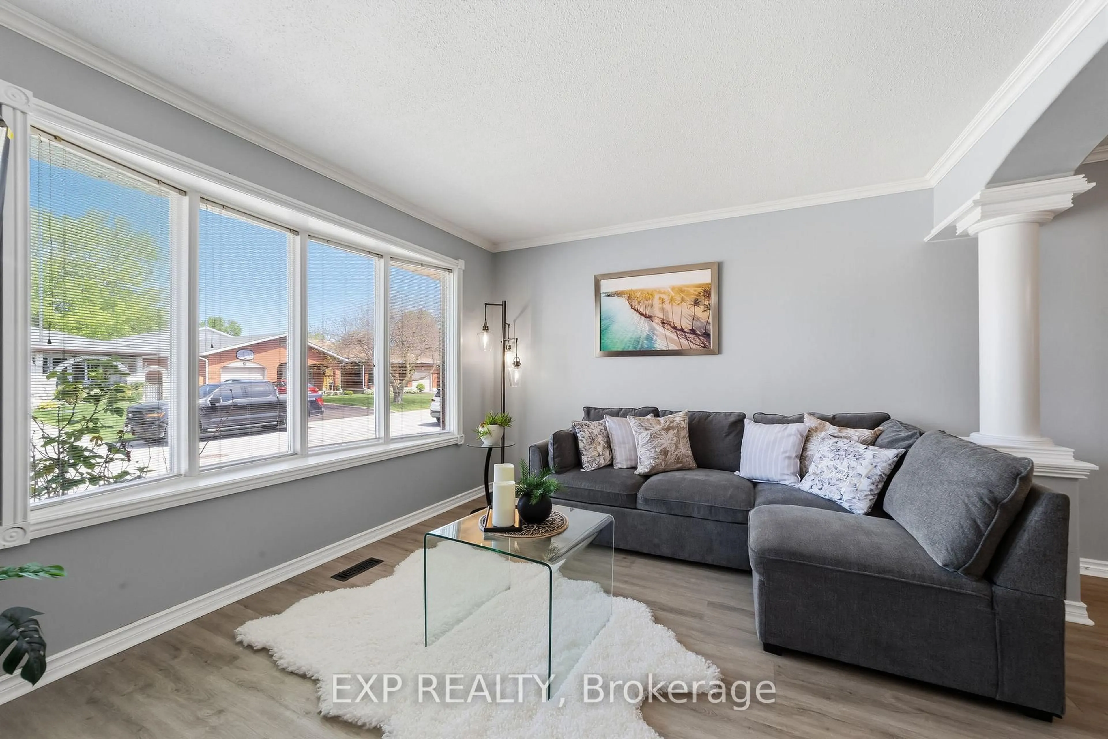 Living room with furniture, wood/laminate floor for 56 Classic Cres, London East Ontario N5W 5T8