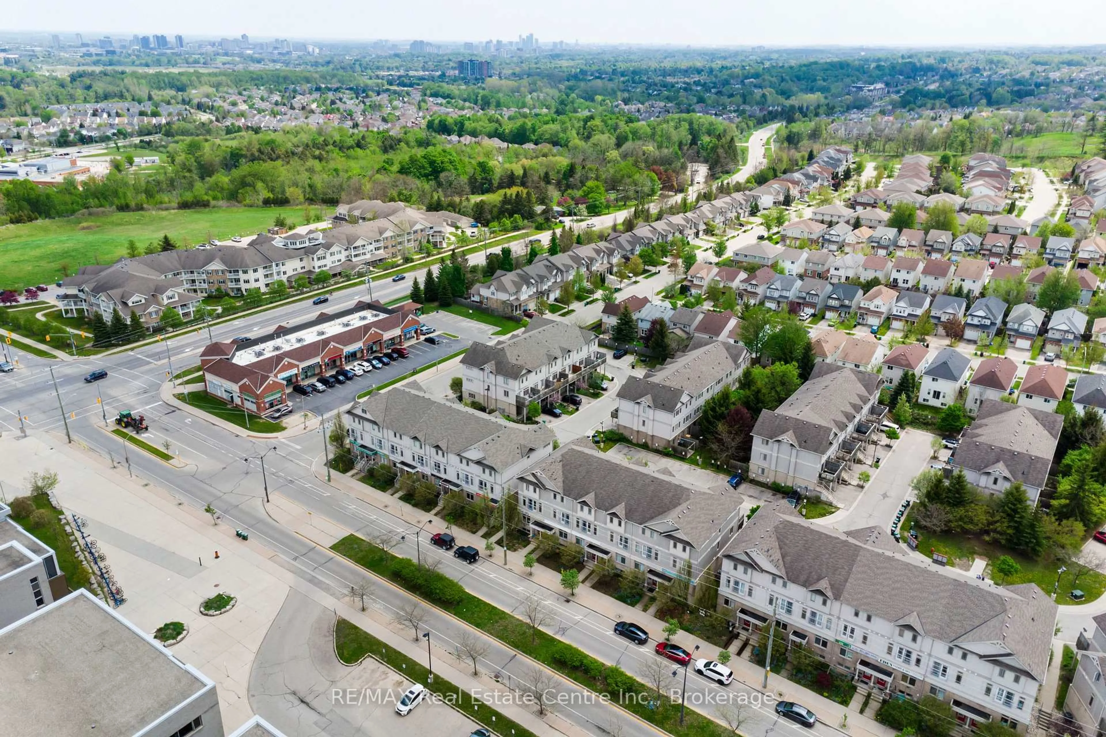 A pic from outside/outdoor area/front of a property/back of a property/a pic from drone, city buildings view from balcony for 619 Wild Ginger Ave #C15 & C16, Waterloo Ontario N2V 2X1