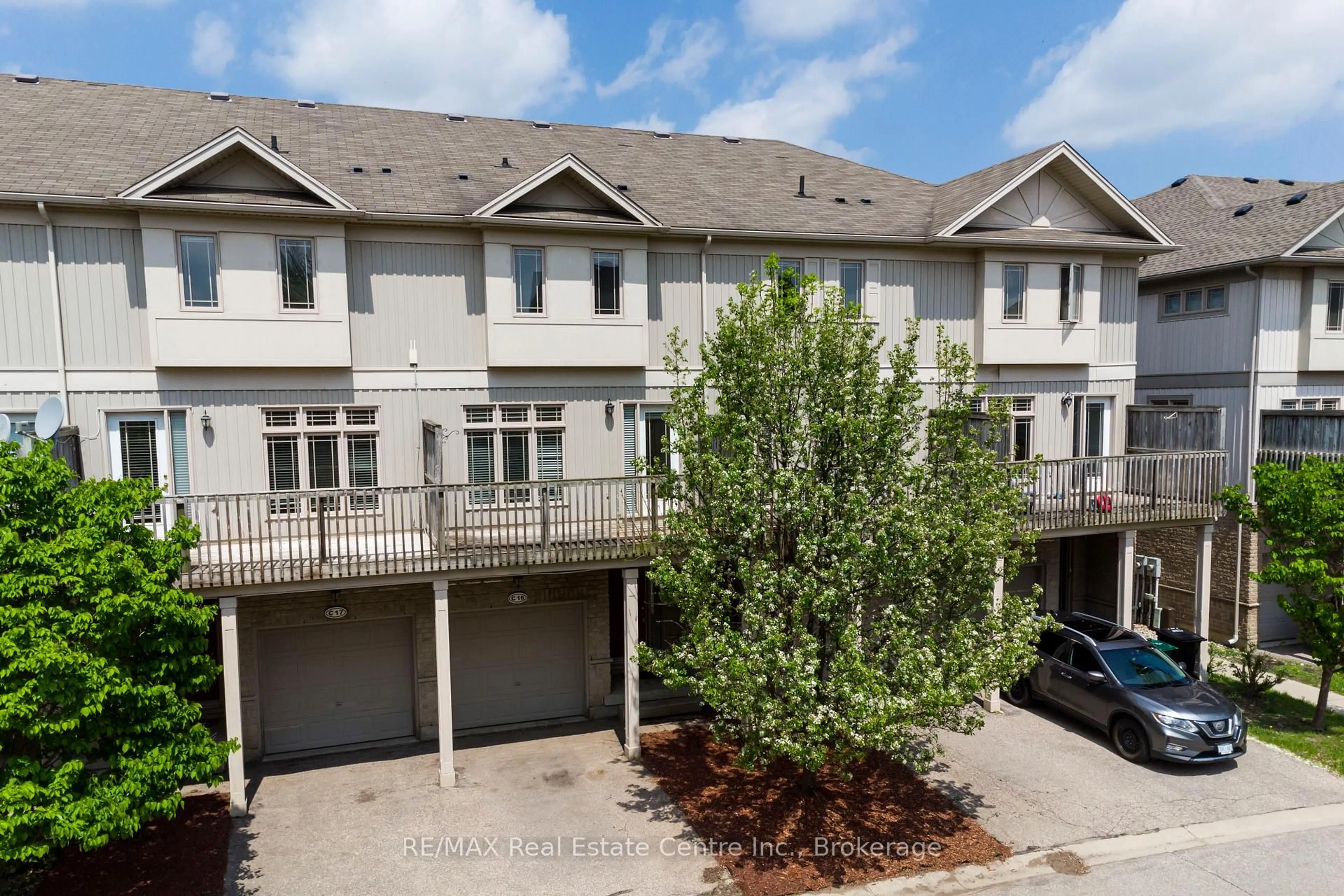 A pic from outside/outdoor area/front of a property/back of a property/a pic from drone, street for 619 Wild Ginger Ave #C15 & C16, Waterloo Ontario N2V 2X1