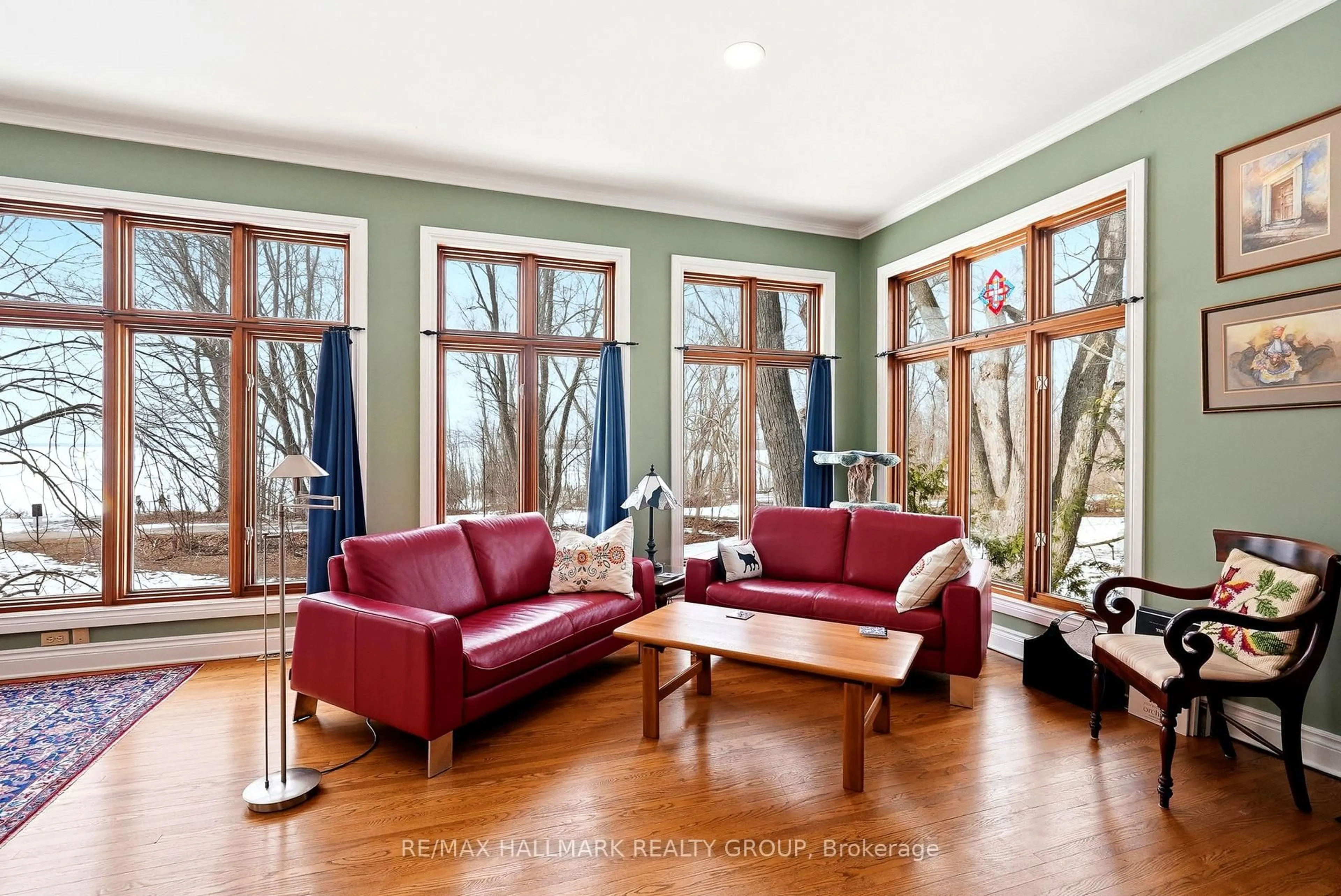 Living room with furniture, wood/laminate floor for 53 Scrivens St, Ottawa Ontario K2B 8M6