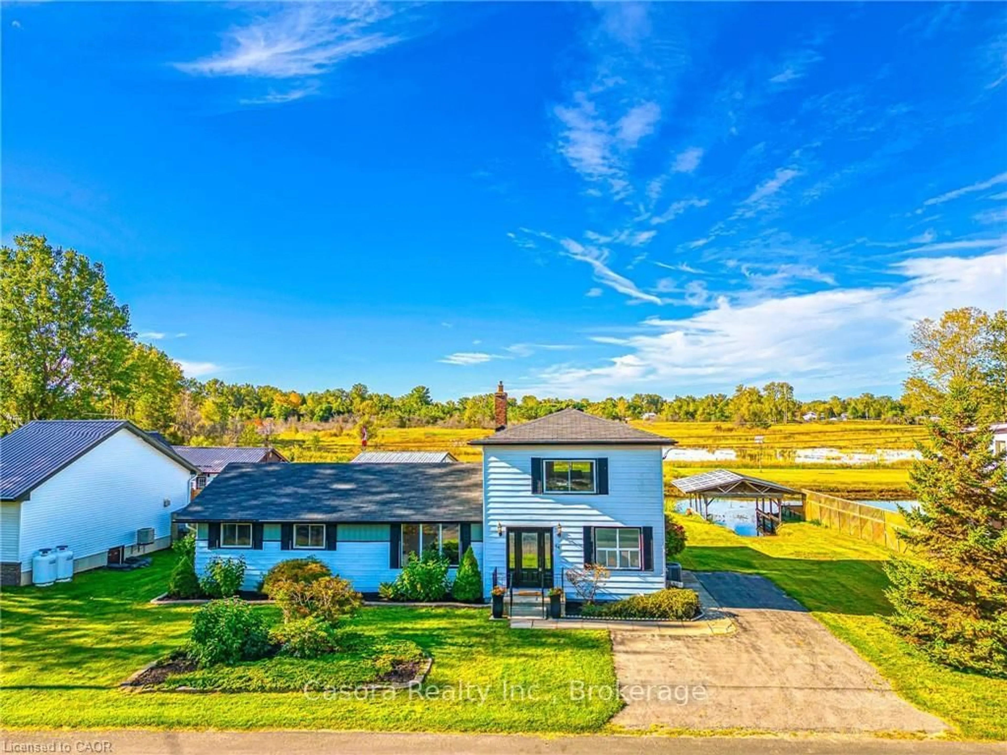 A pic from outside/outdoor area/front of a property/back of a property/a pic from drone, water/lake/river/ocean view for 44 Old Cut Blvd, Norfolk Ontario N0E 1M0