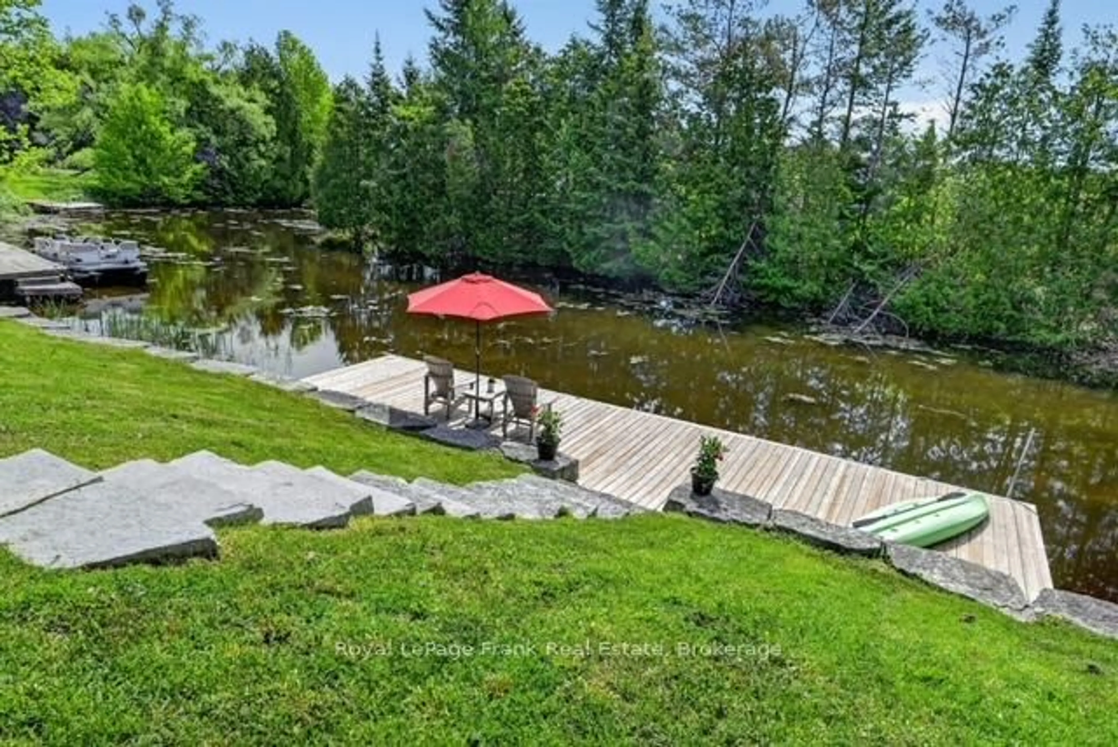 A pic from outside/outdoor area/front of a property/back of a property/a pic from drone, water/lake/river/ocean view for 34 Rideau Dr, Kawartha Lakes Ontario K0M 1N0