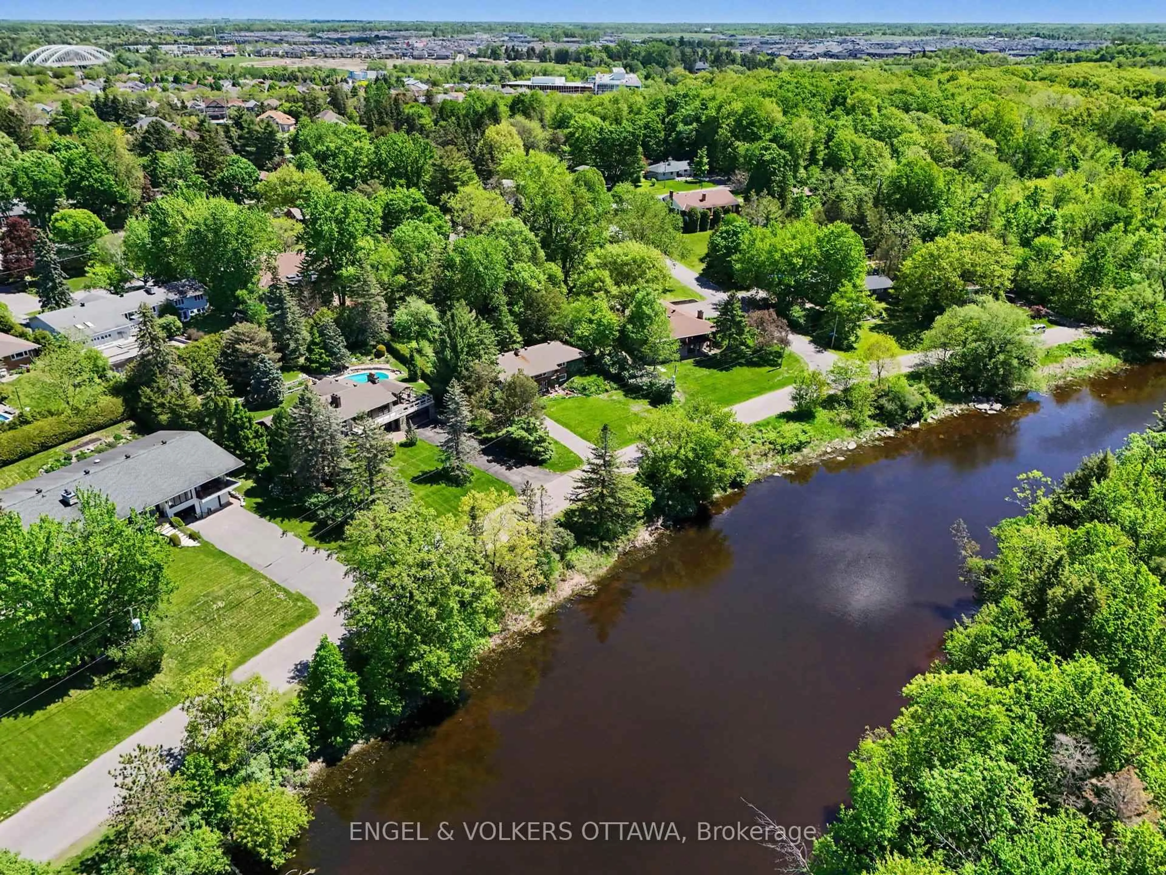 A pic from outside/outdoor area/front of a property/back of a property/a pic from drone, water/lake/river/ocean view for 17 Goodwood Dr, Ottawa Ontario K2J 3Z8