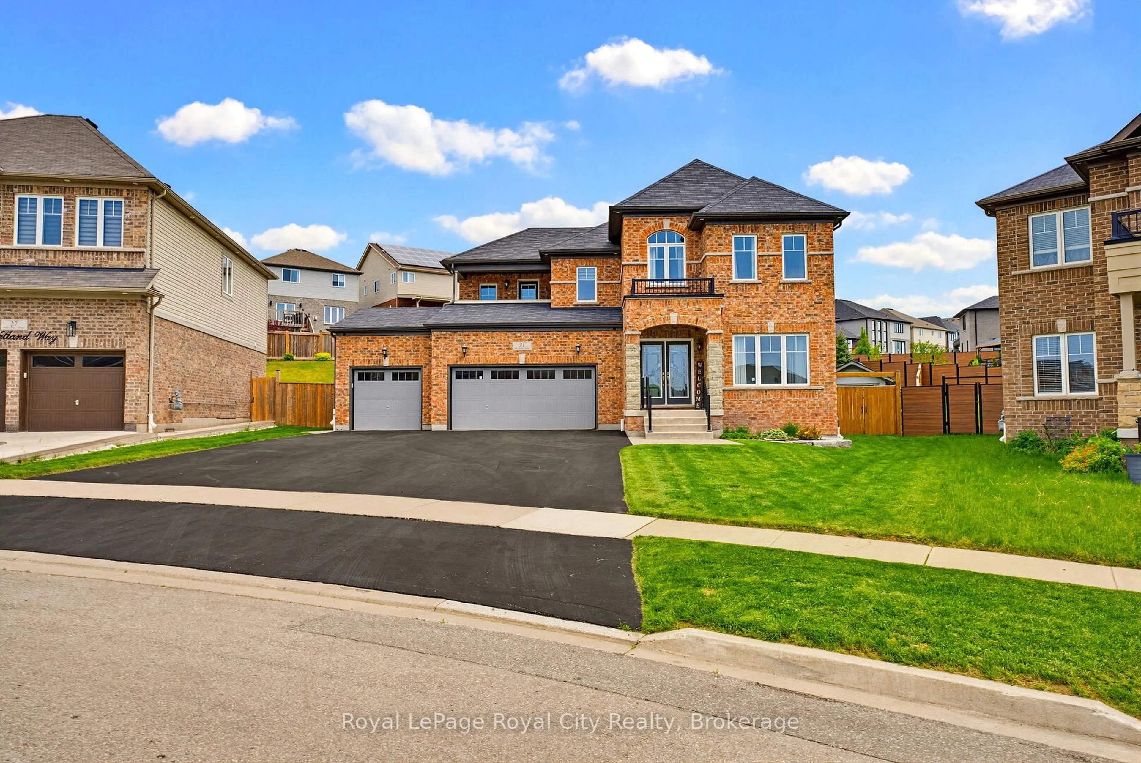 Home with brick exterior material, street for 31 Wetland Way, Kitchener Ontario N2P 2Y8