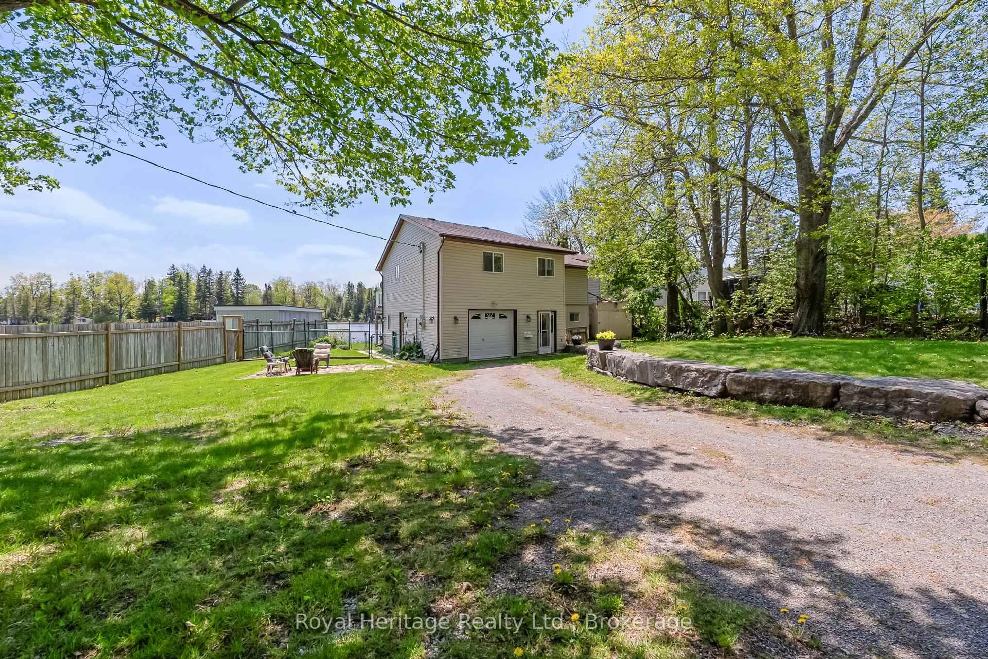 A pic from outside/outdoor area/front of a property/back of a property/a pic from drone, street for 16 Fire Route 122, Trent Lakes Ontario K0M 1A0