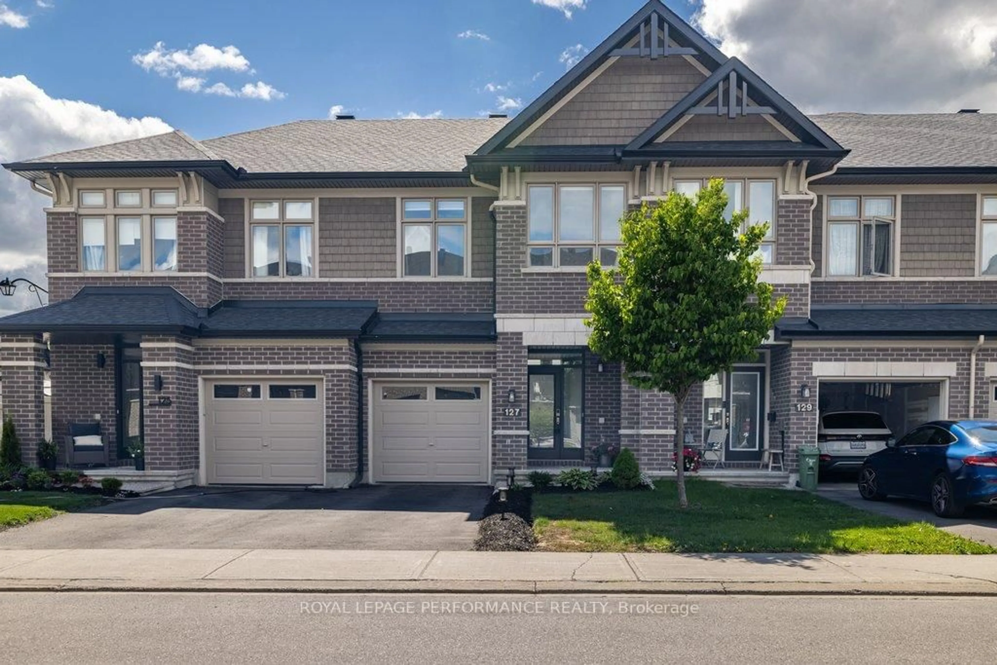 A pic from outside/outdoor area/front of a property/back of a property/a pic from drone, street for 127 Wild Calla Way, Ottawa Ontario K1W 0K4
