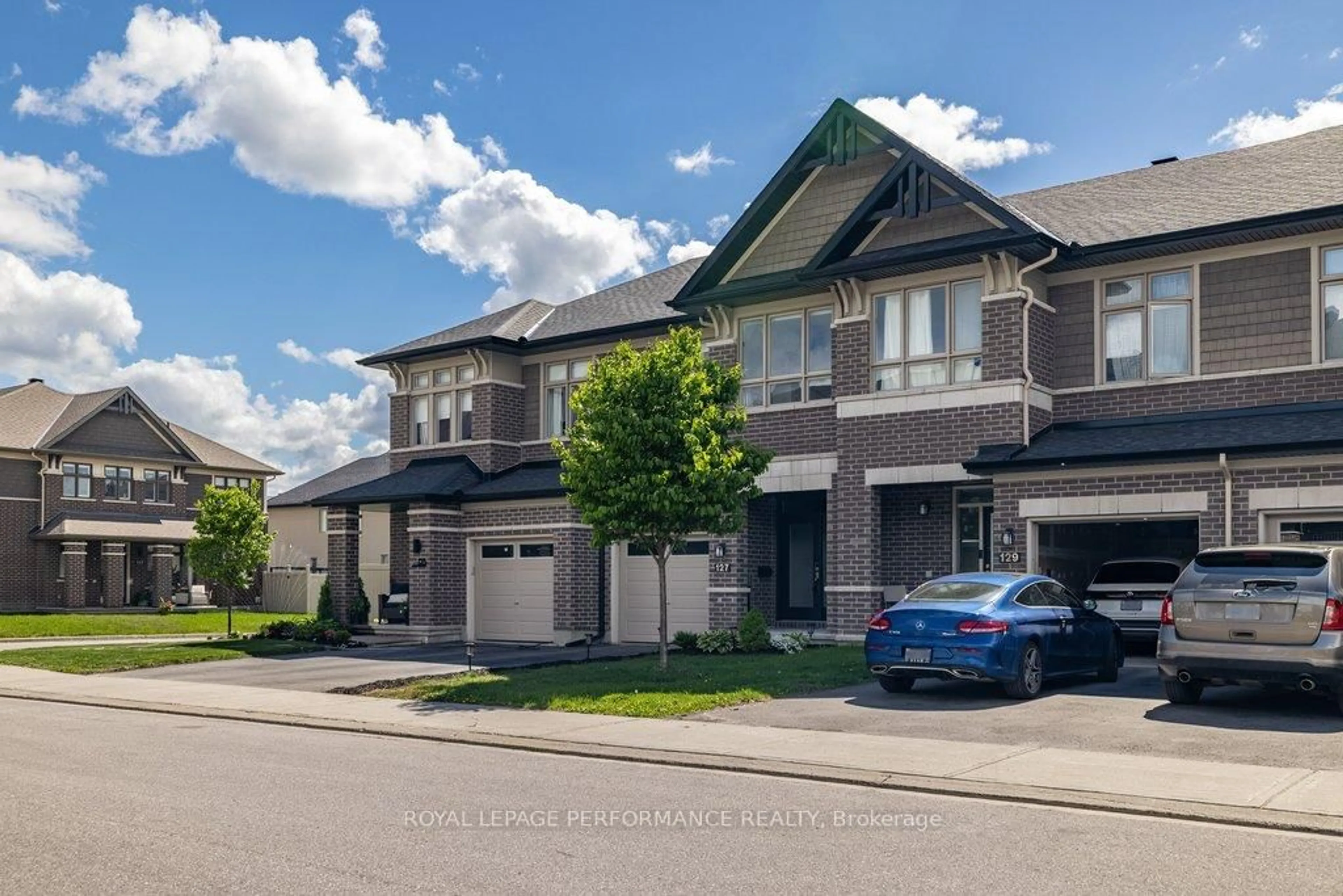 A pic from outside/outdoor area/front of a property/back of a property/a pic from drone, street for 127 Wild Calla Way, Ottawa Ontario K1W 0K4