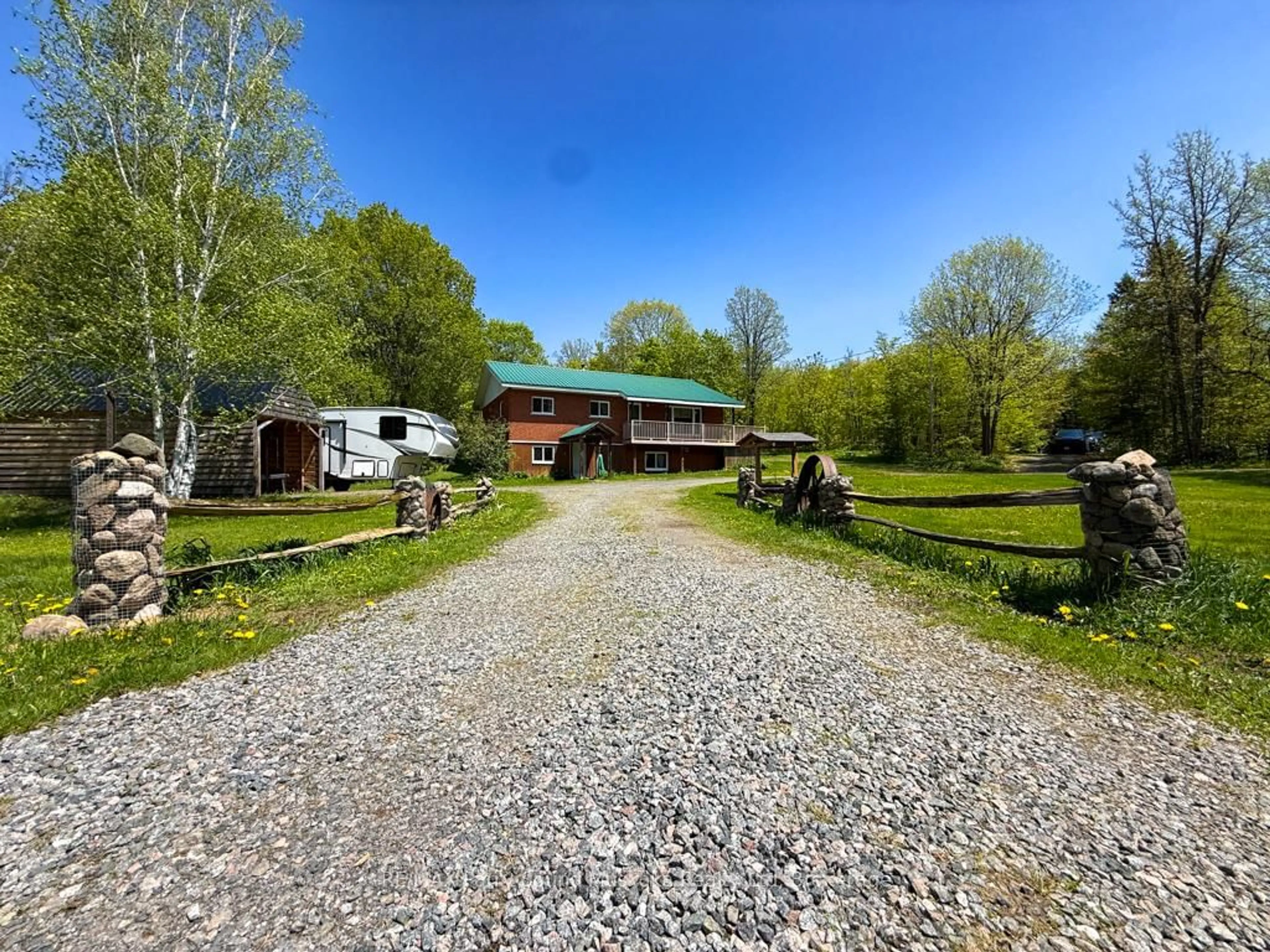A pic from outside/outdoor area/front of a property/back of a property/a pic from drone, unknown for 690 Hurdville Rd, McKellar Ontario P2A 2W7